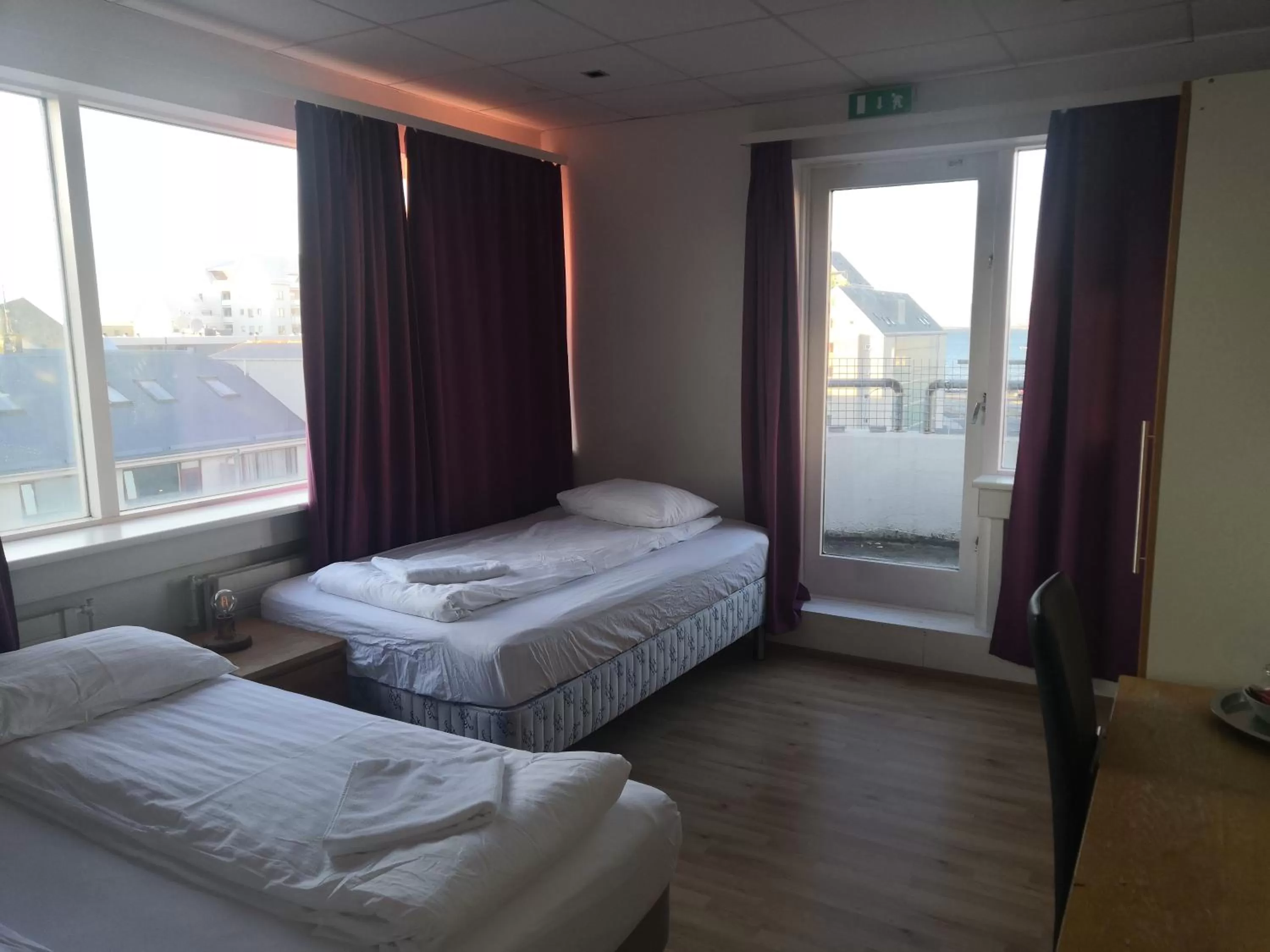 Triple Room with Balcony in 101 Guesthouse Hotel