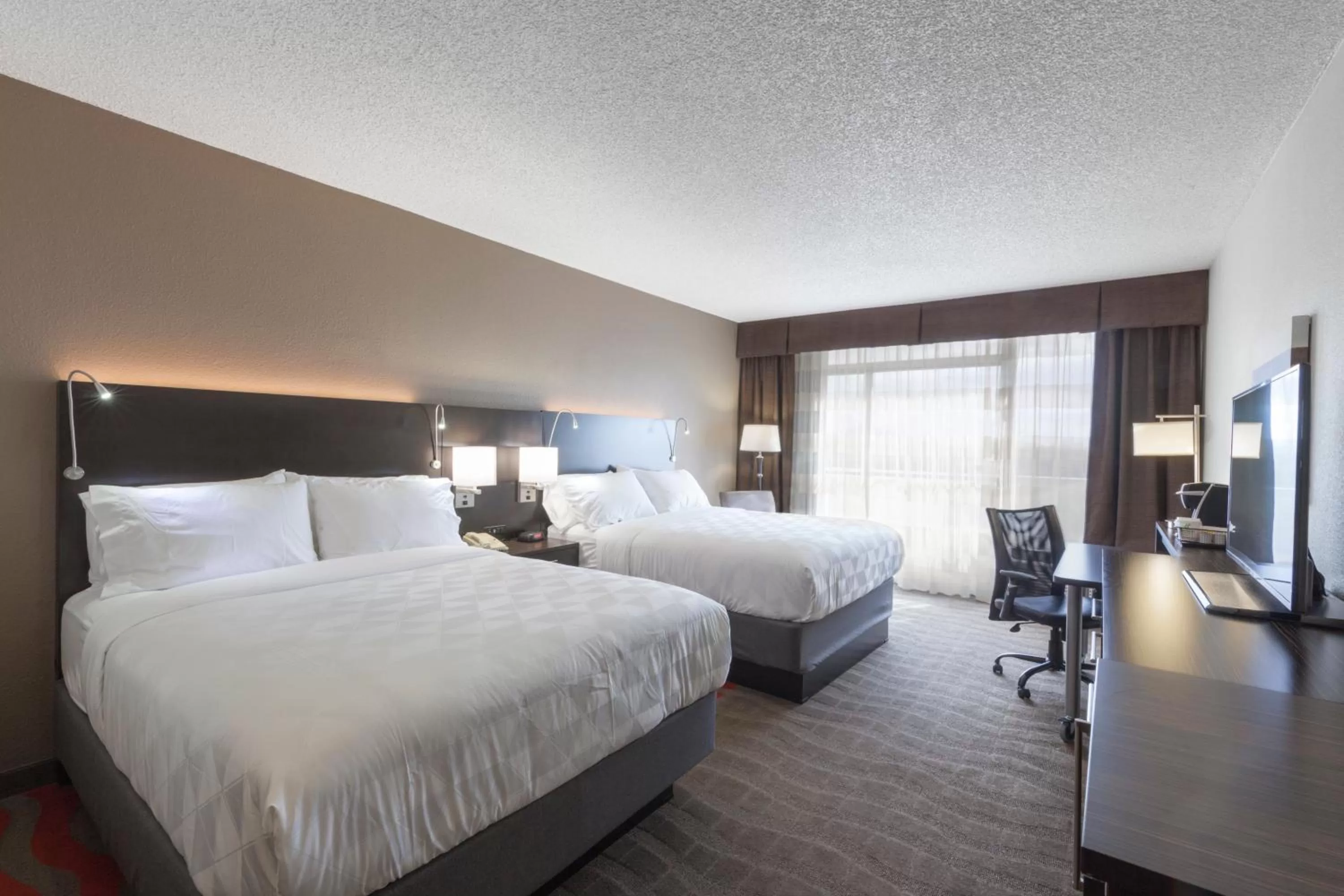 Standard Queen Room with Two Queen Beds and Balcony in Holiday Inn Austin Midtown by IHG
