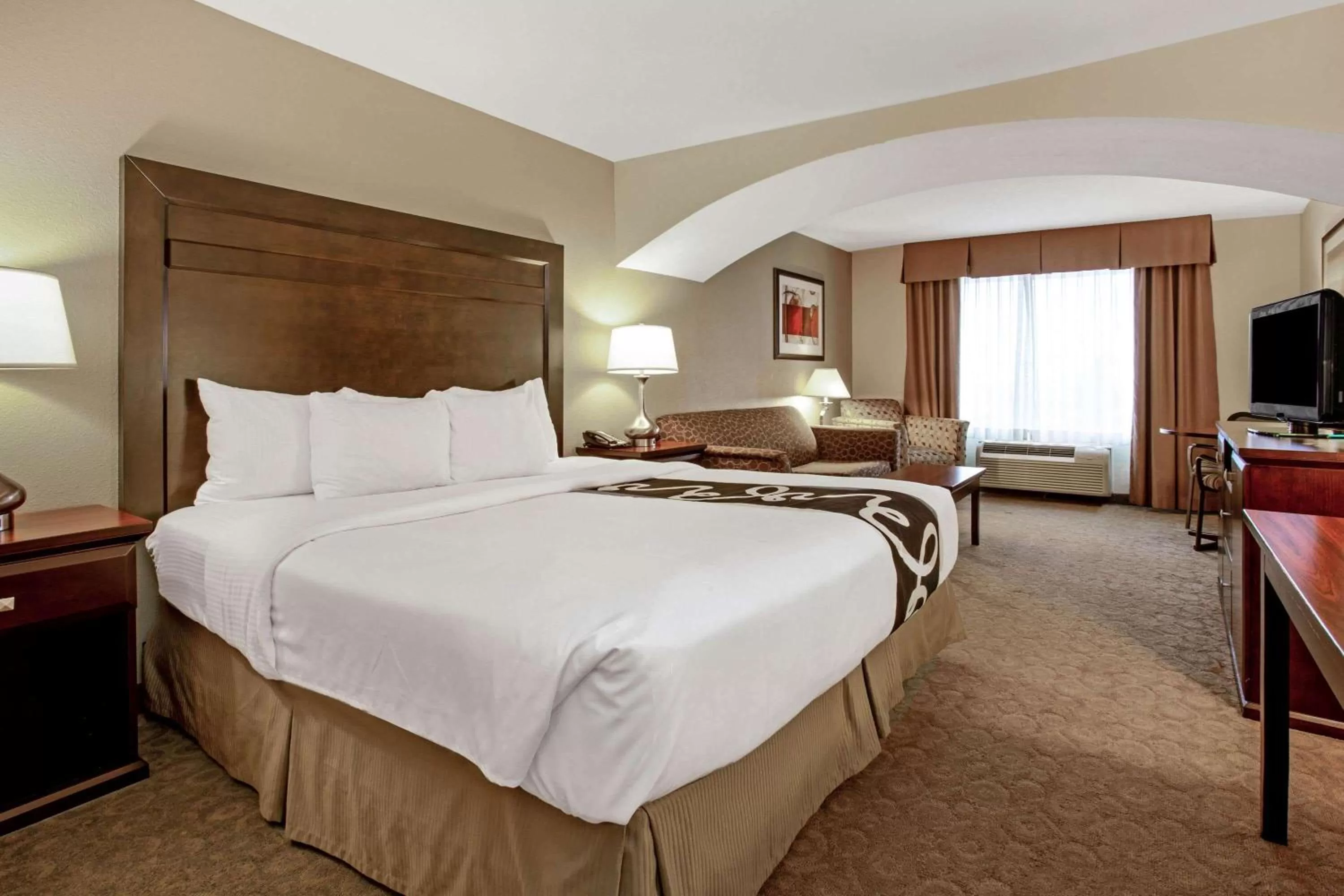 Deluxe Executive King Room with Two Queen Beds and Mobility/Hearing Impaired Access - Non-Smoking in La Quinta by Wyndham Bismarck