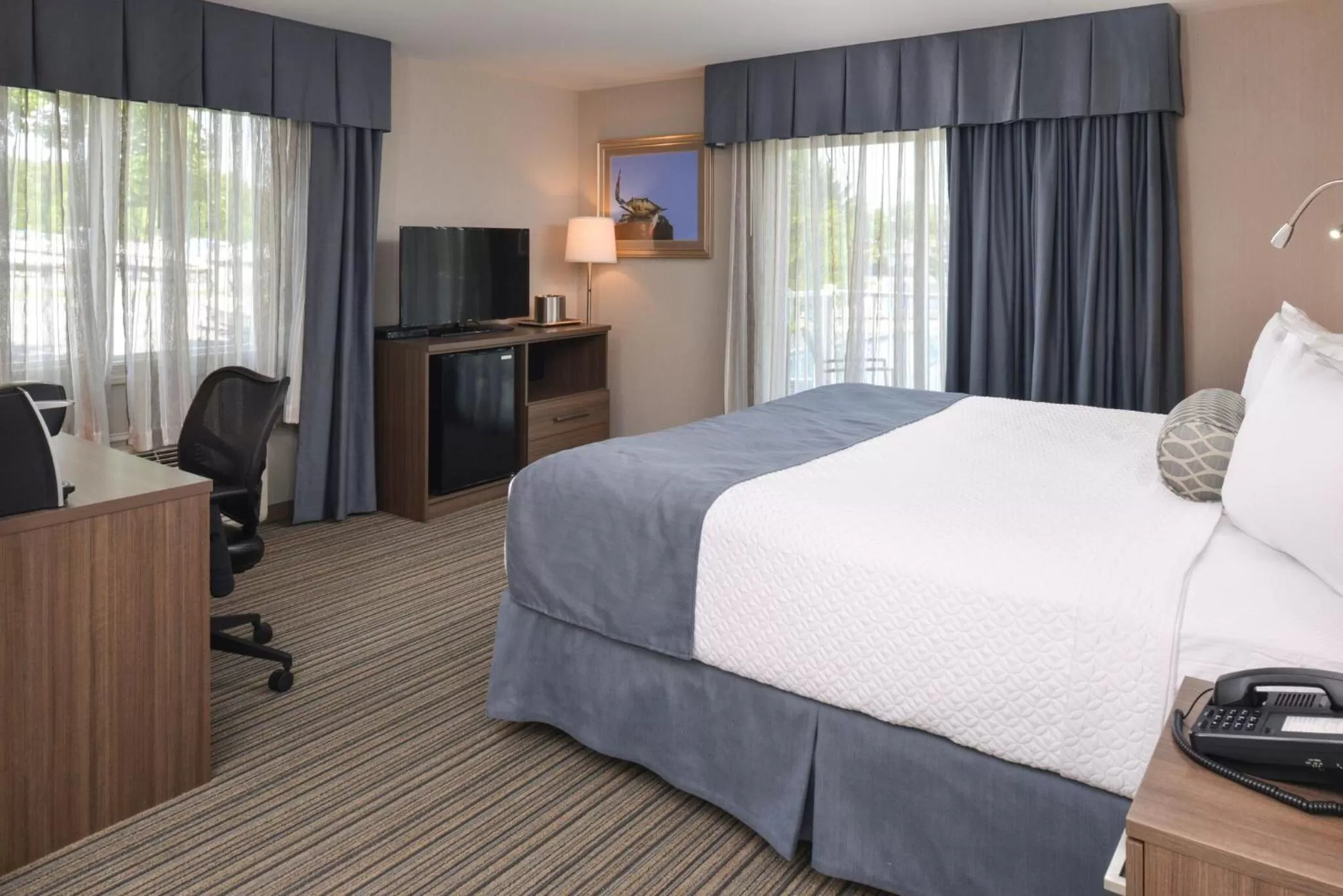 King Room with Balcony in Anchored Inn at Hidden Harbor