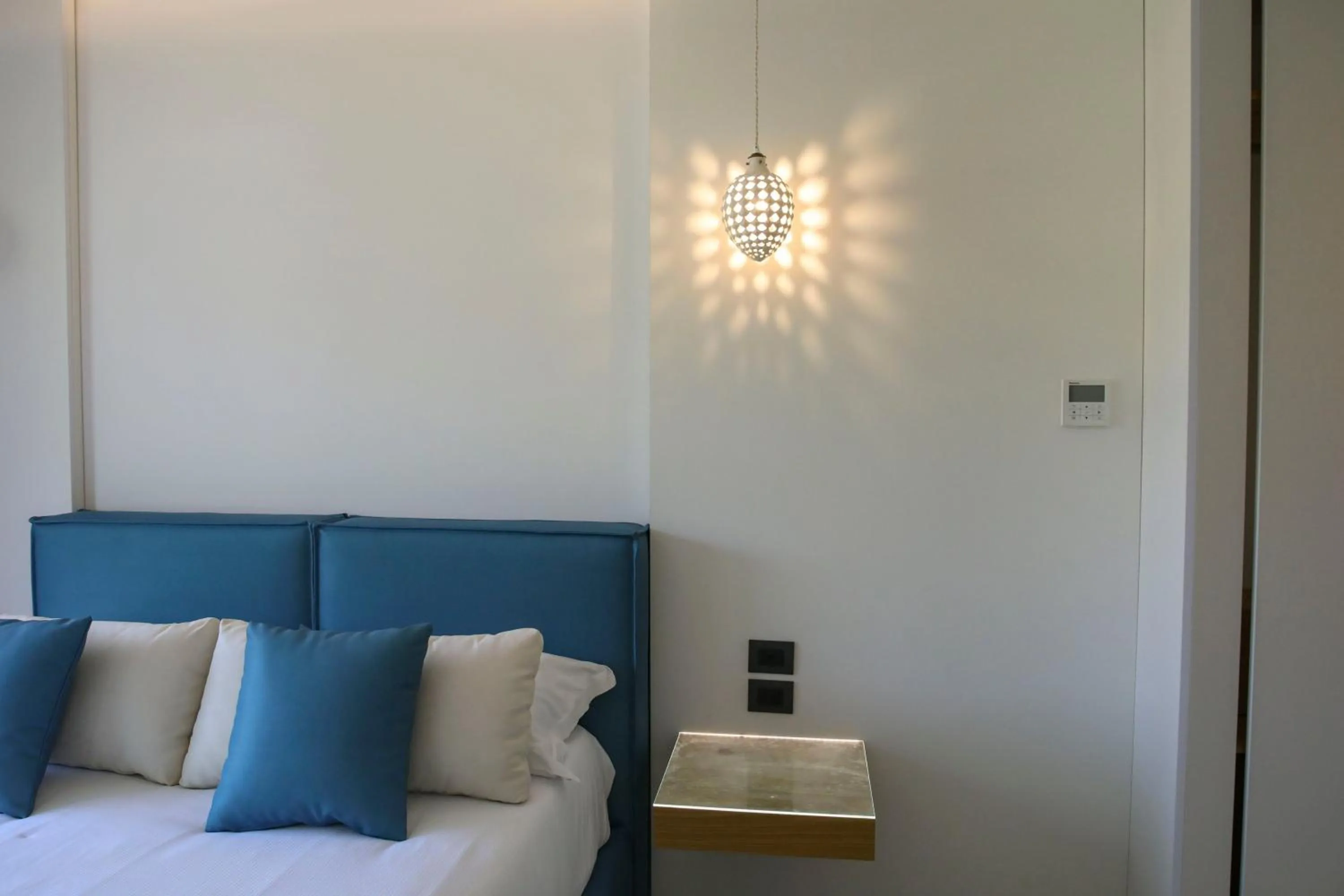 Bed in Sunset Hotel