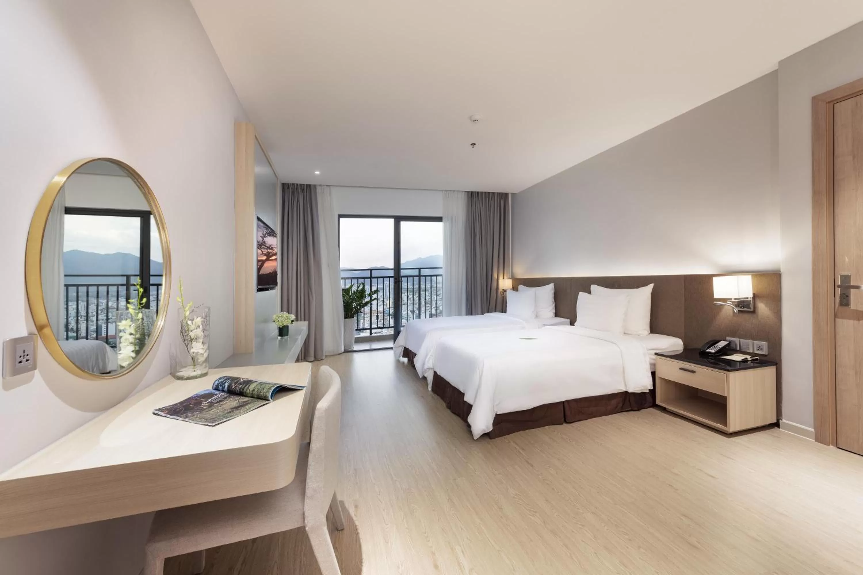 Family Room with Balcony Partial Sea View in DQua Hotel