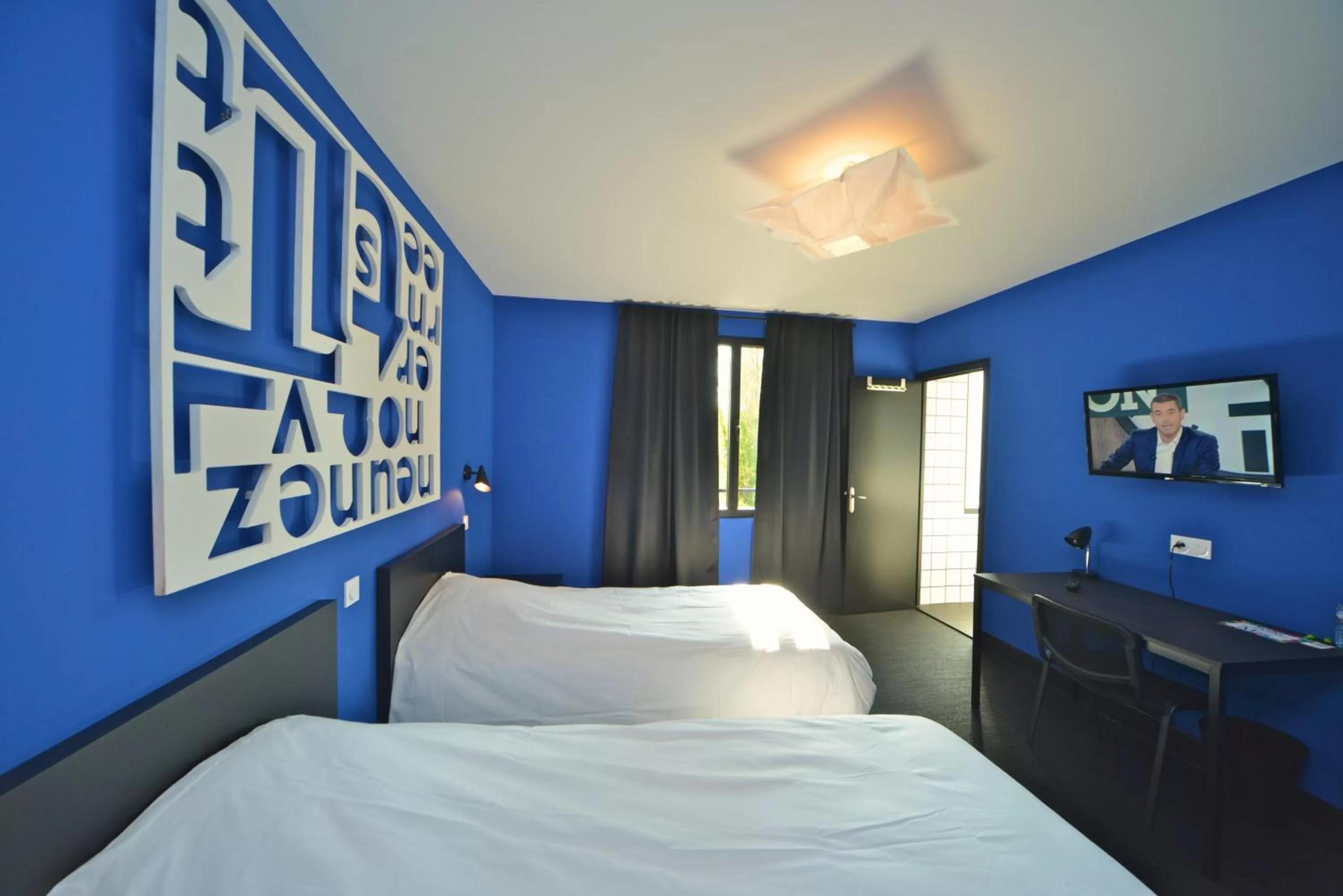 Twin Room in Logis - Hotel et Restaurant La Mire