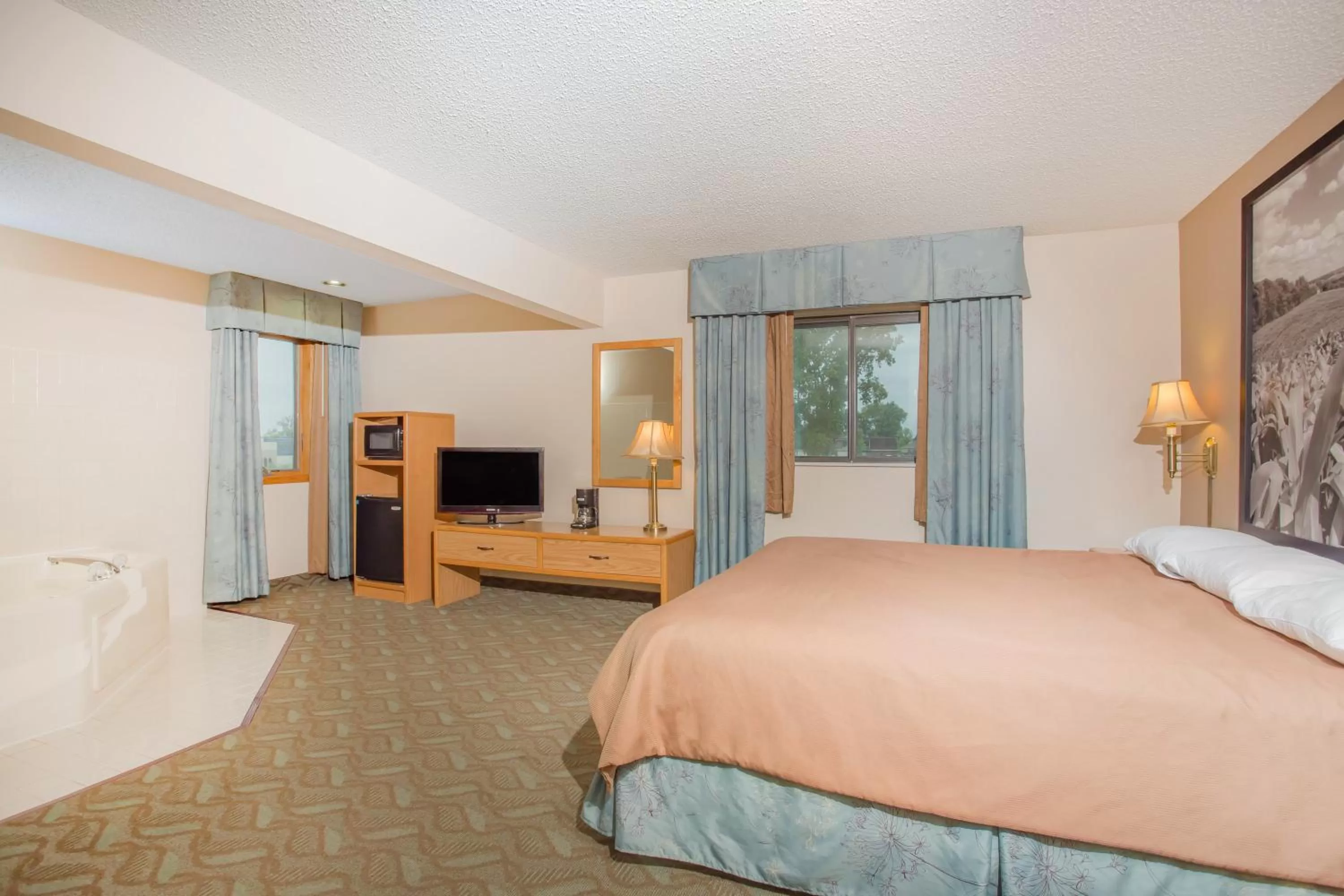 Deluxe King Suite - Non-Smoking in Super 8 by Wyndham Monroe WI