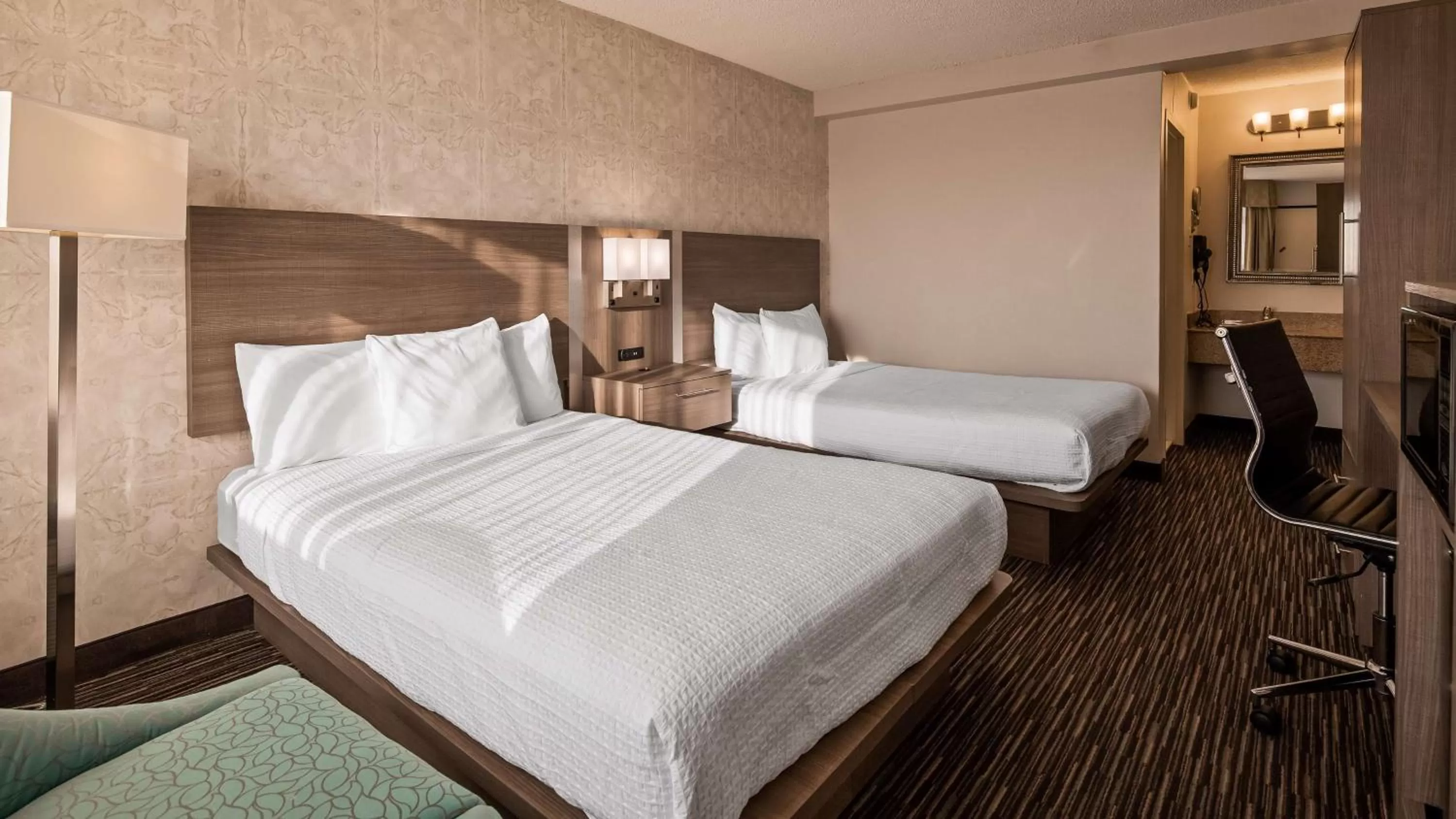 Double Room with Two Double Beds and Mobility Accessible Roll-In Shower in Best Western Mill River Manor