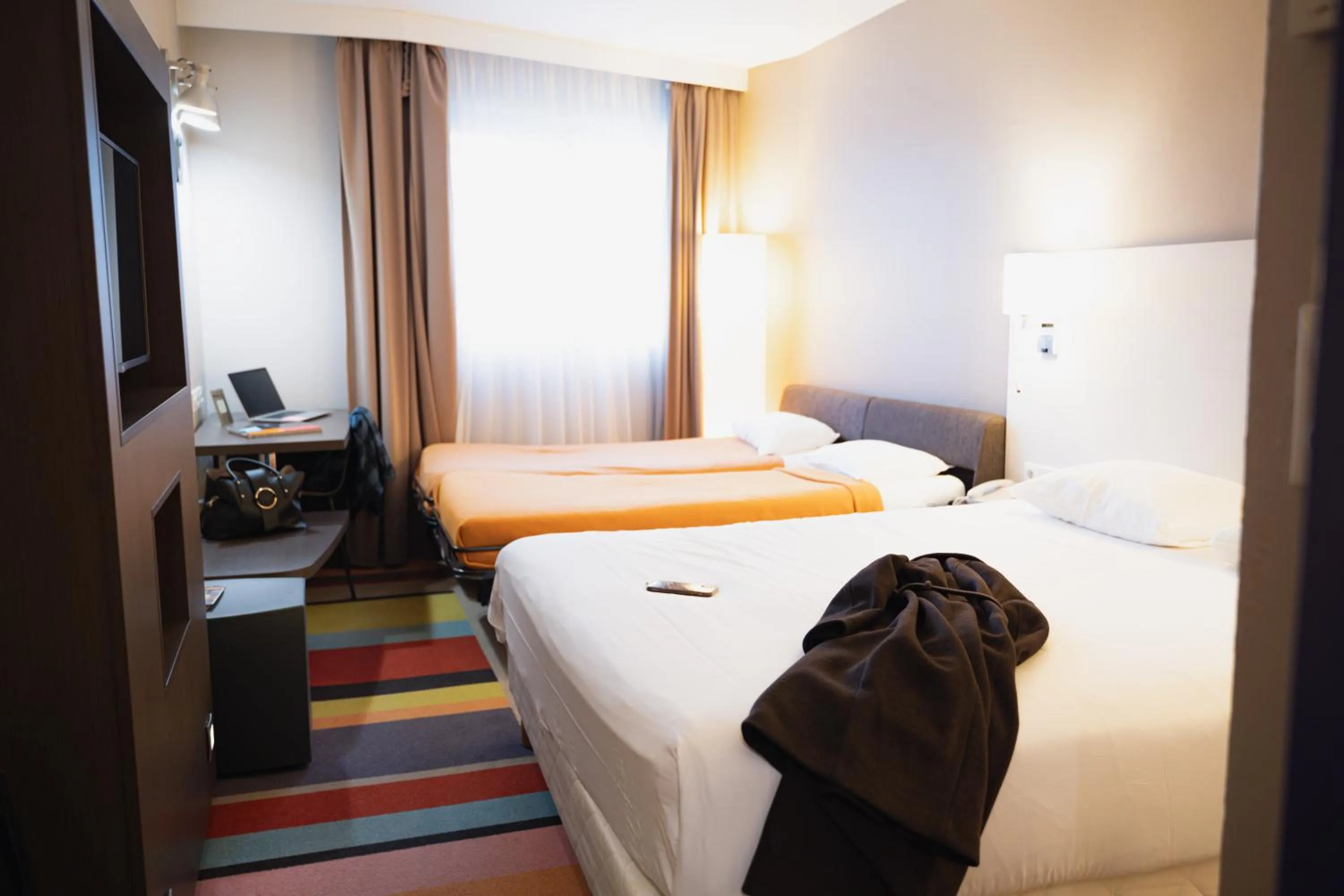Family Room with One Double Bed and Sofa Bed in ibis Styles Lyon Sud Vienne