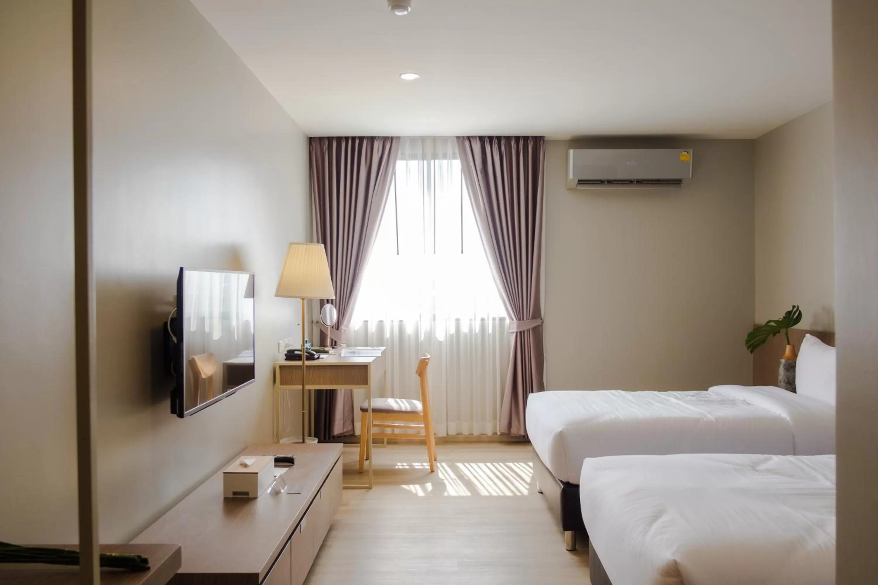 Deluxe Twin Room in The Rise Suites Hotel, Chiang Mai - SHA Extra Plus