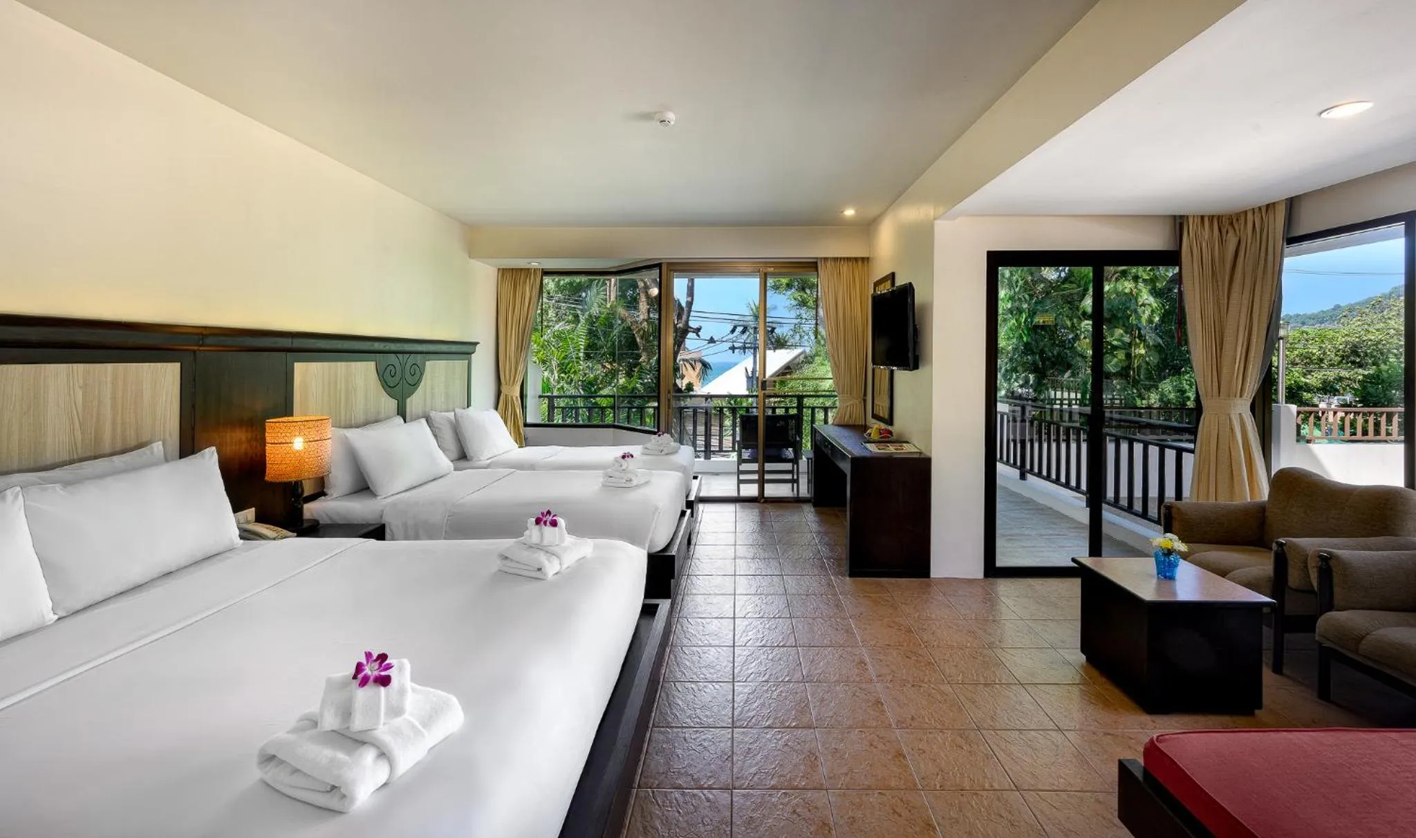 Quadruple Room with Balcony in Patong Lodge Hotel - Thailand's Green Hotel Plus