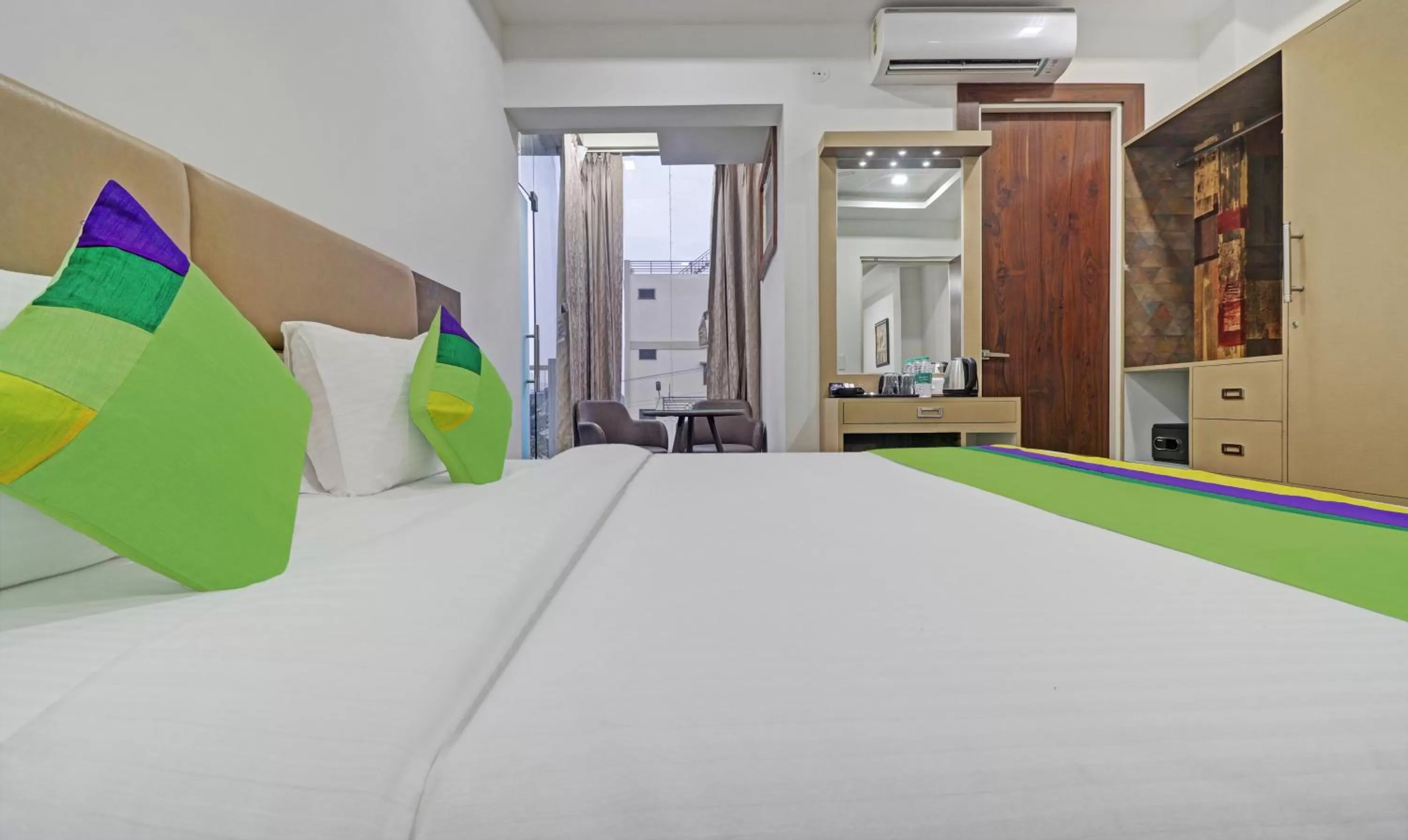 Deluxe Room with Balcony - single occupancy in Treebo Kanopy Greens