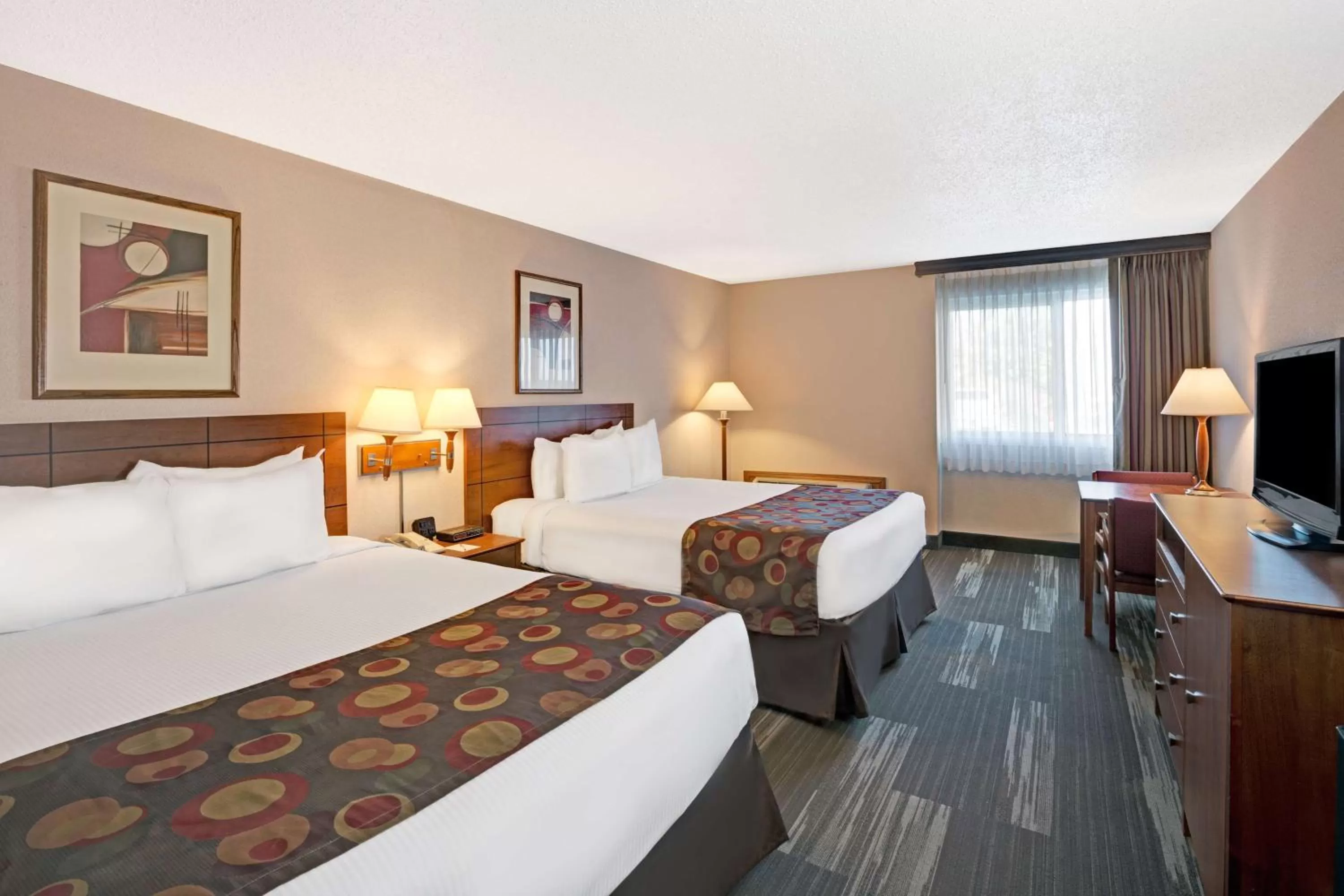 Queen Room with Two Queen Beds - Pet Friendly/Non-Smoking in Ramada by Wyndham Bismarck