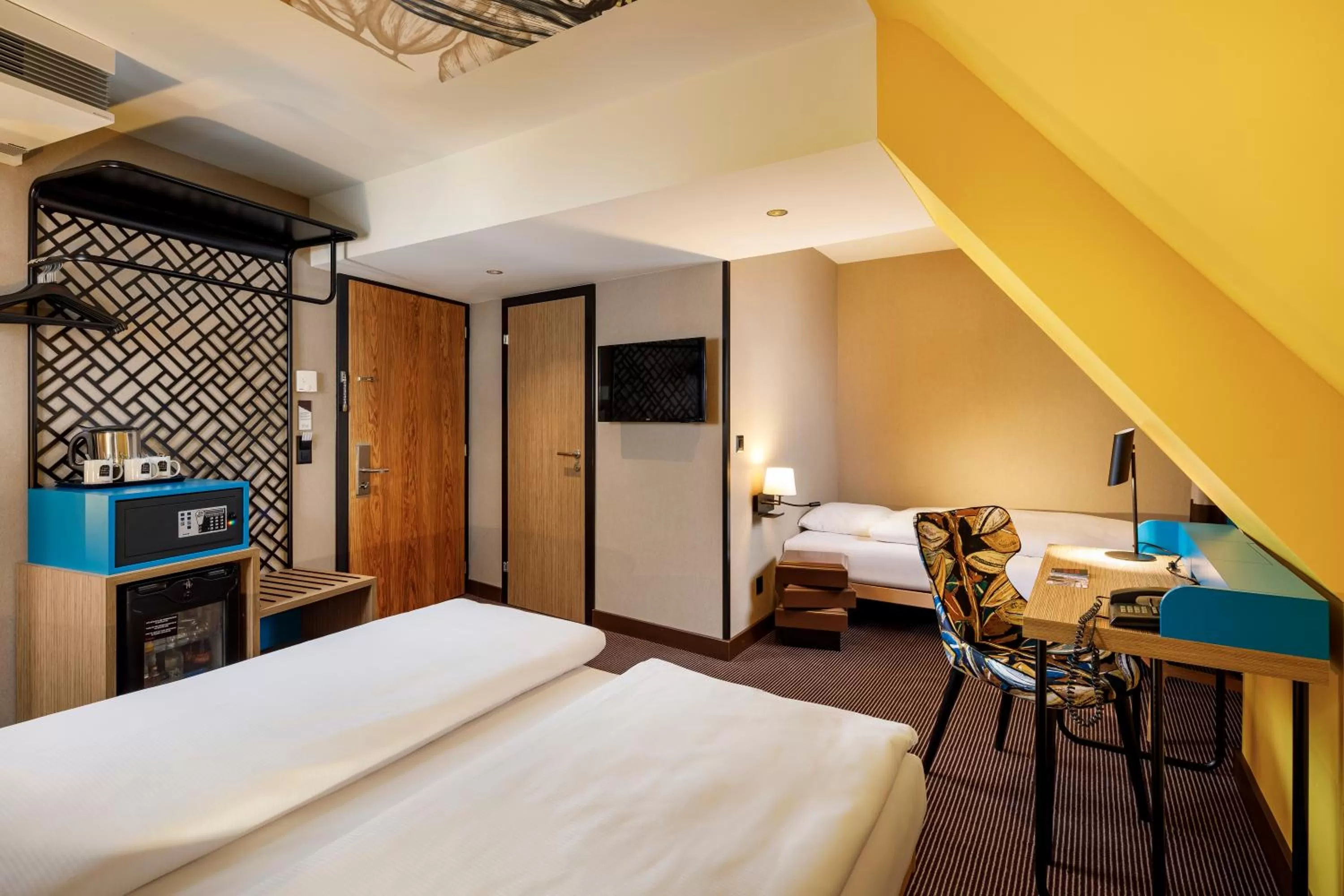 Superior Triple Room - single occupancy in Swiss Chocolate by Fassbind Zurich