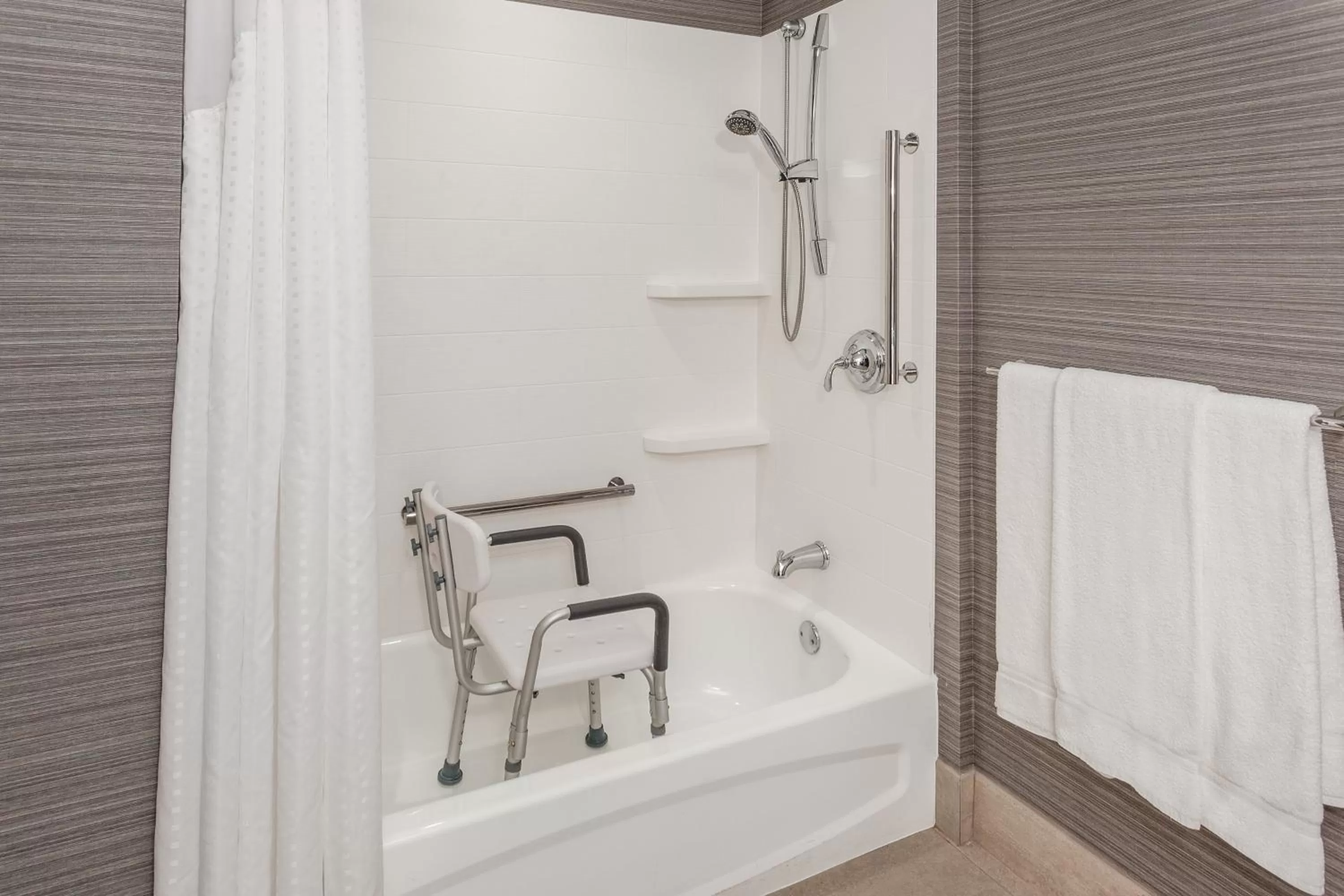 King Suite with Sofa Bed - Hearing Accessible in Holiday Inn Express Hotel & Suites East End by IHG