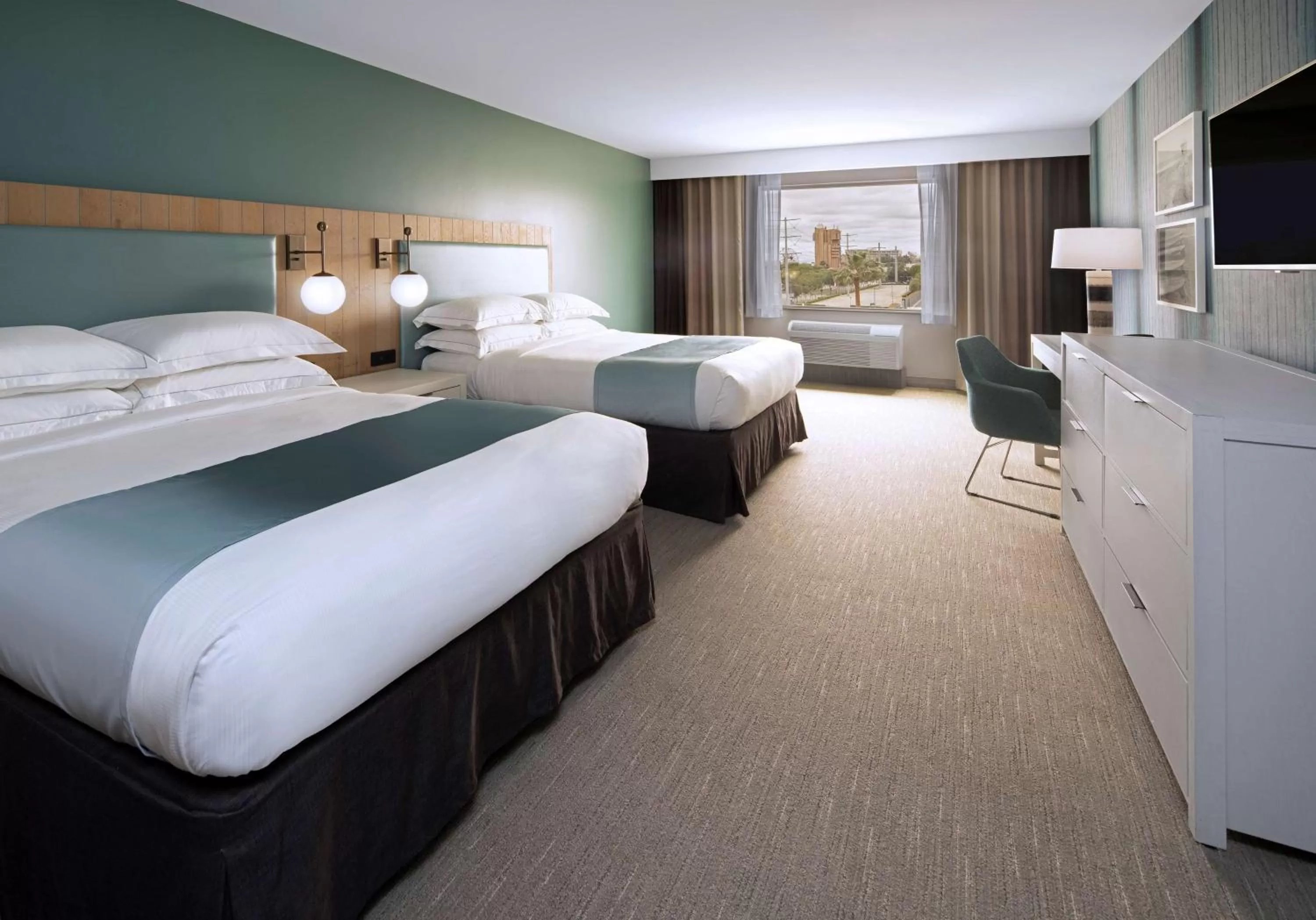 Queen Room with Two Queen Beds, Disney Park and Pool View in SunCoast Hotel Anaheim, Tapestry Collection by Hilton