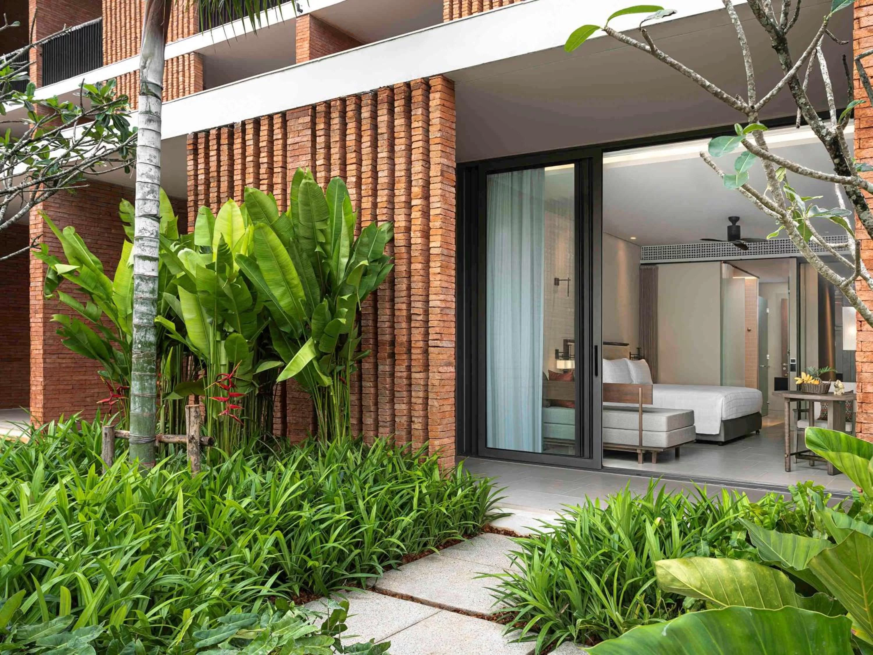 Deluxe King Room with Garden Access in Pullman Khao Lak Resort