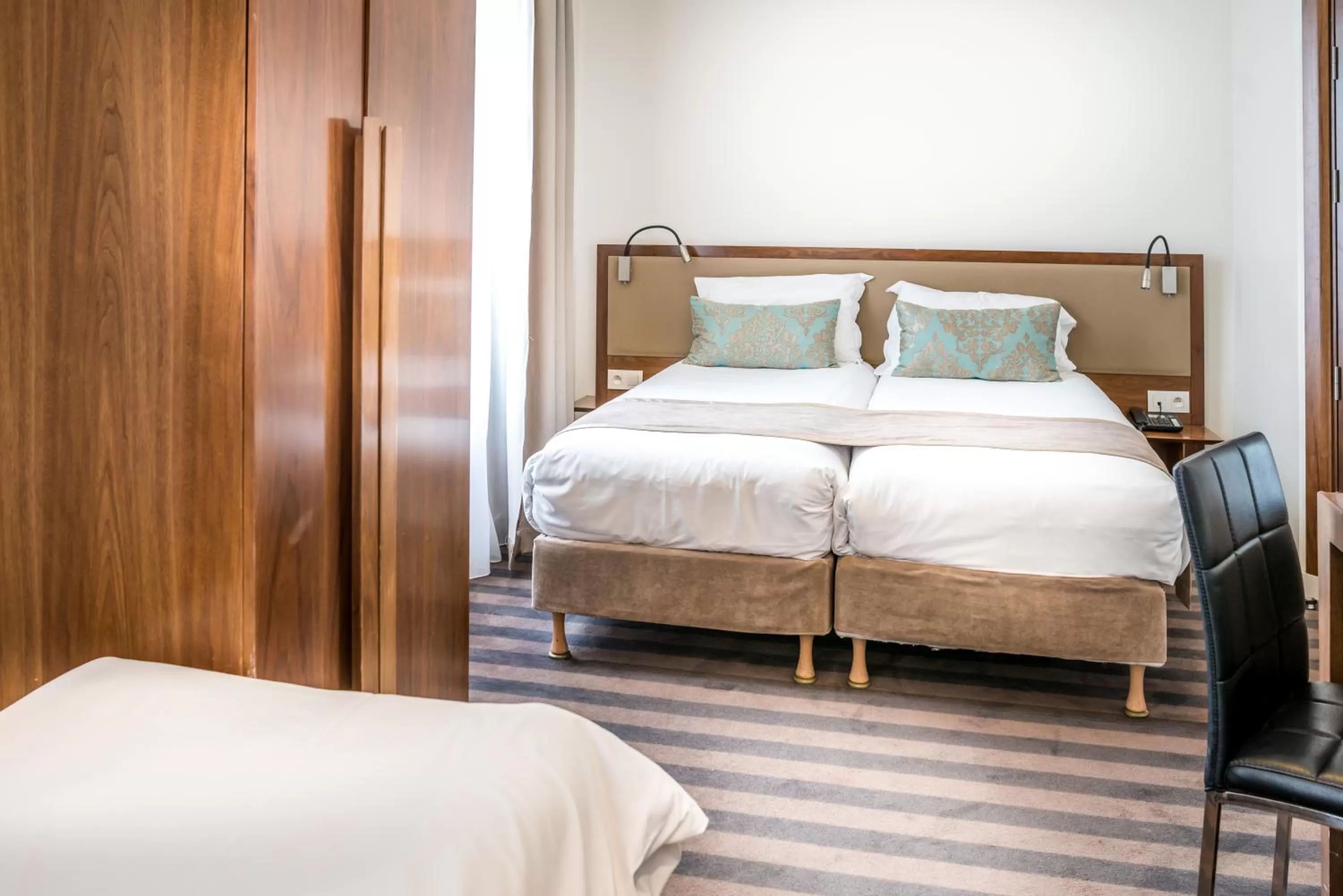 Two Rooms next to Each Other in Art Hotel Eiffel