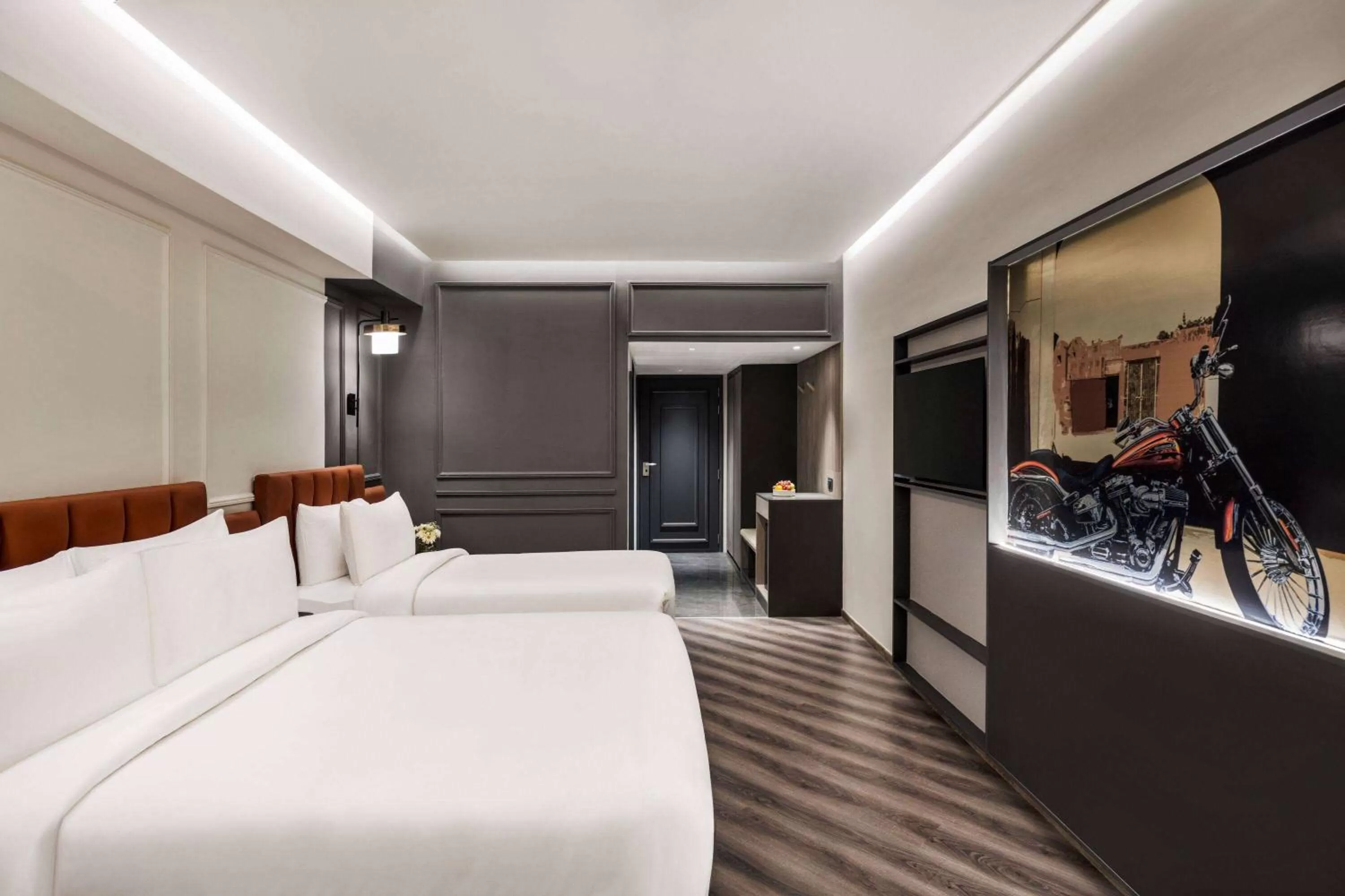 Hollywood Queen Room with Queen and Twin Bed in Ramada Encore by Wyndham Indore Nipania