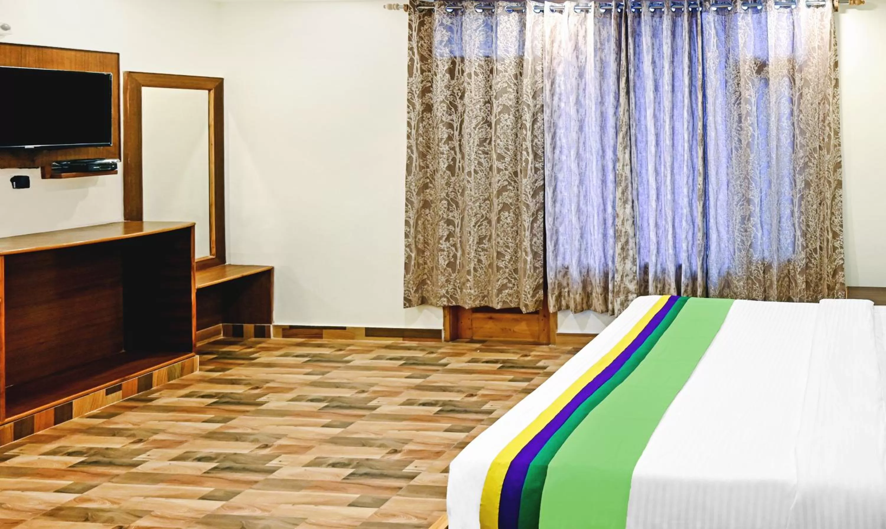 Deluxe Double Room in Treebo Trend Hotel Dev With Valley View