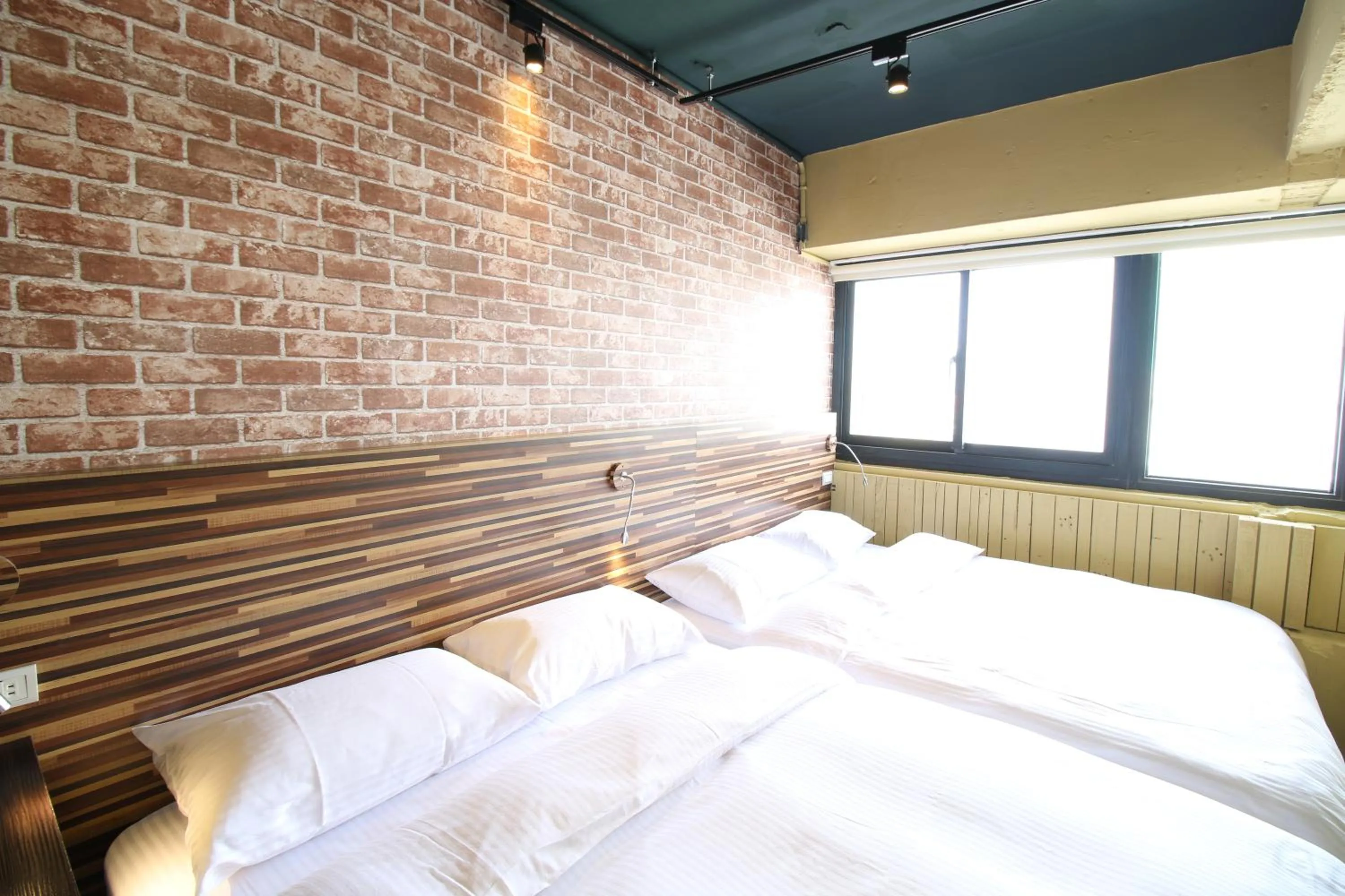 Standard Quadruple Room in R10 Eco Hotel