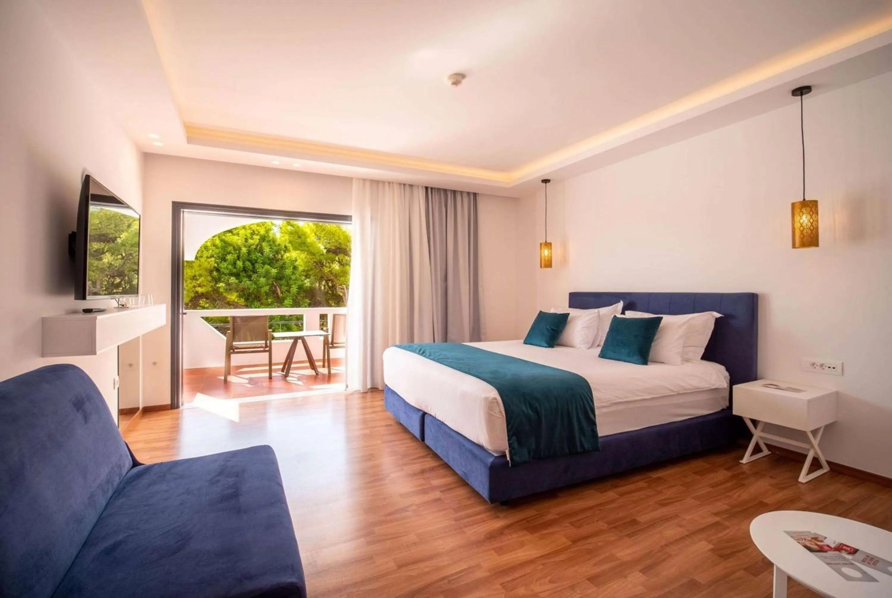 Panorama Junior Suite with Garden View in Ramada Loutraki Poseidon Resort