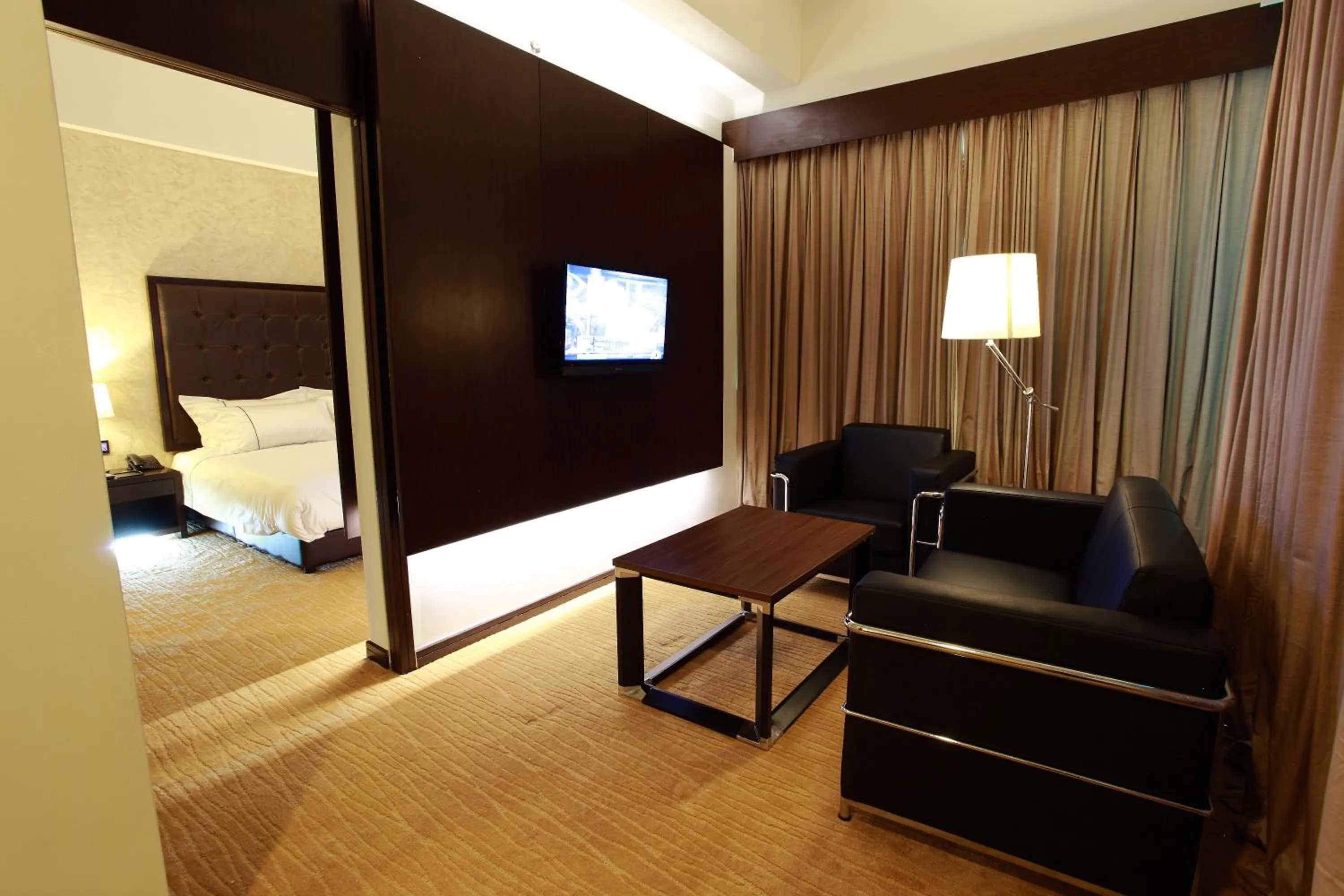 Deluxe King Suite in Symphony Suites Hotel