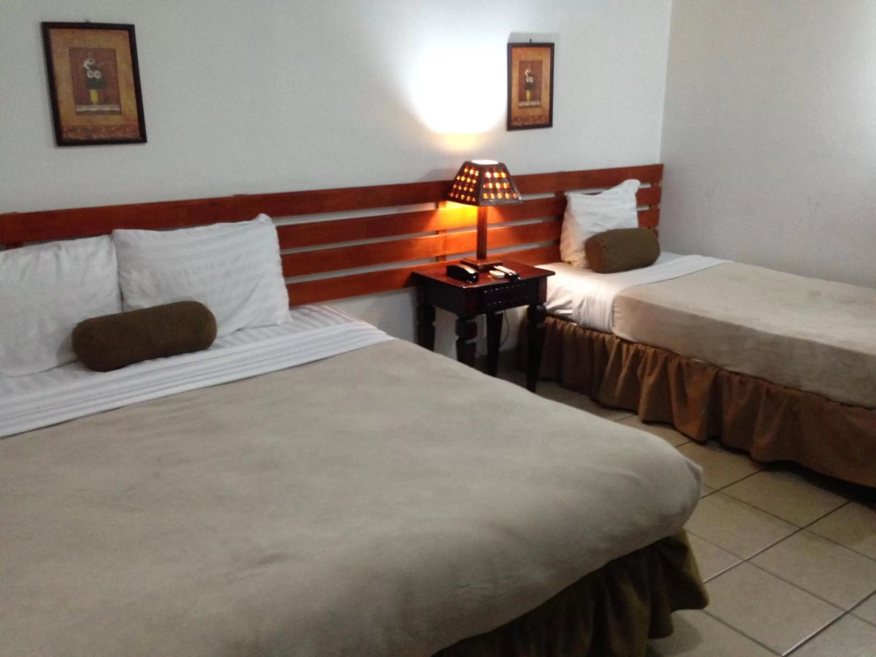 Family Room with King Bed and One Bunk Bed in Hotel Mozonte