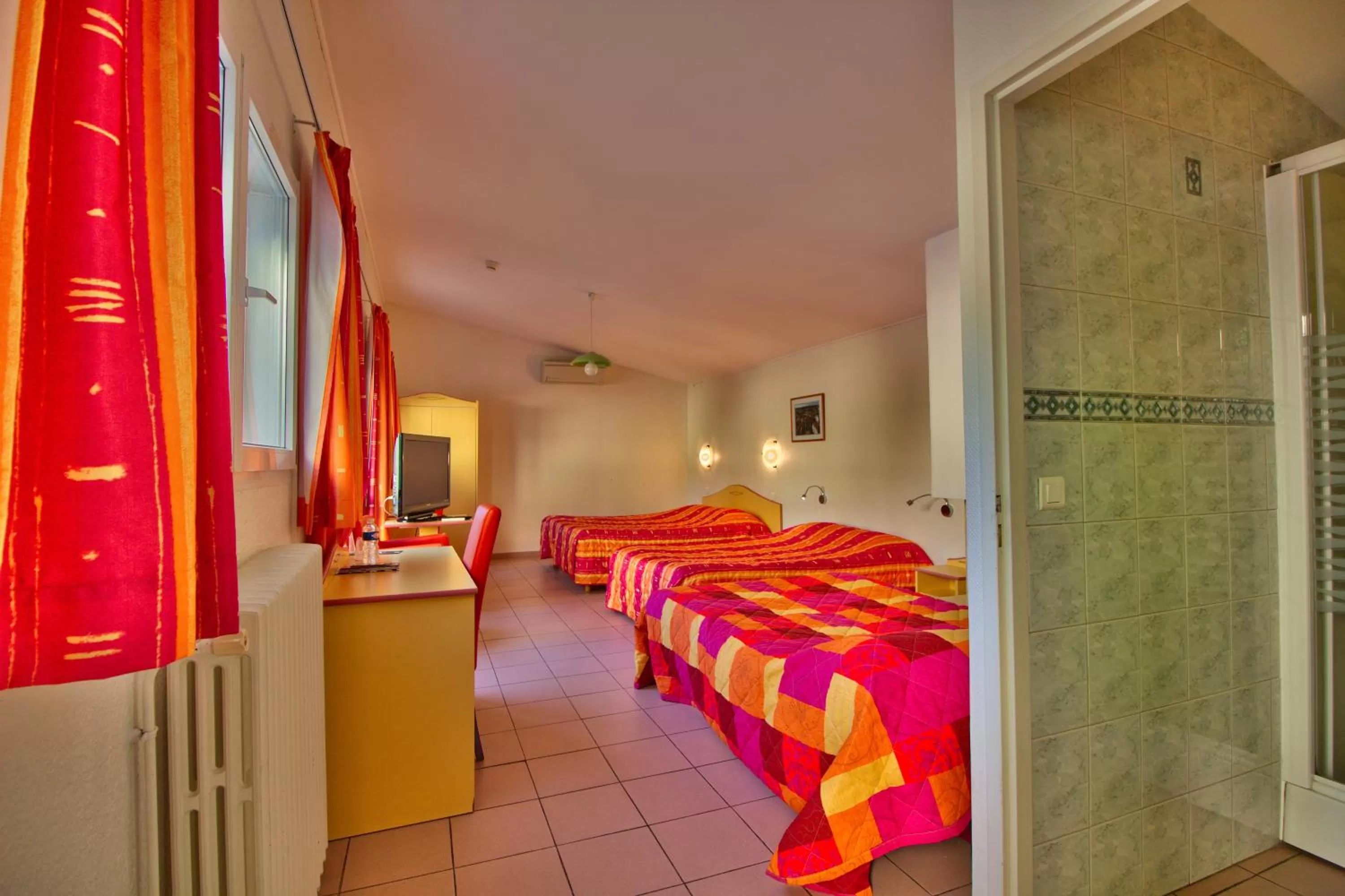 Quadruple Room in Logis Hôtel Restaurant Le Chalet du Mont Roland