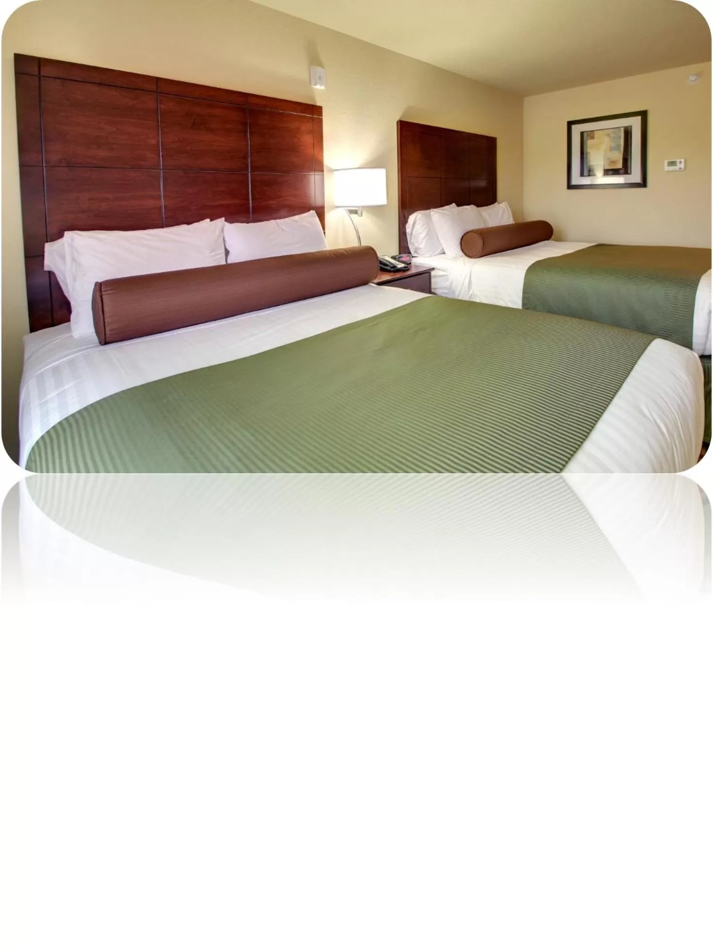 Queen Room with Two Queen Beds in Cobblestone Inn & Suites - Harvey