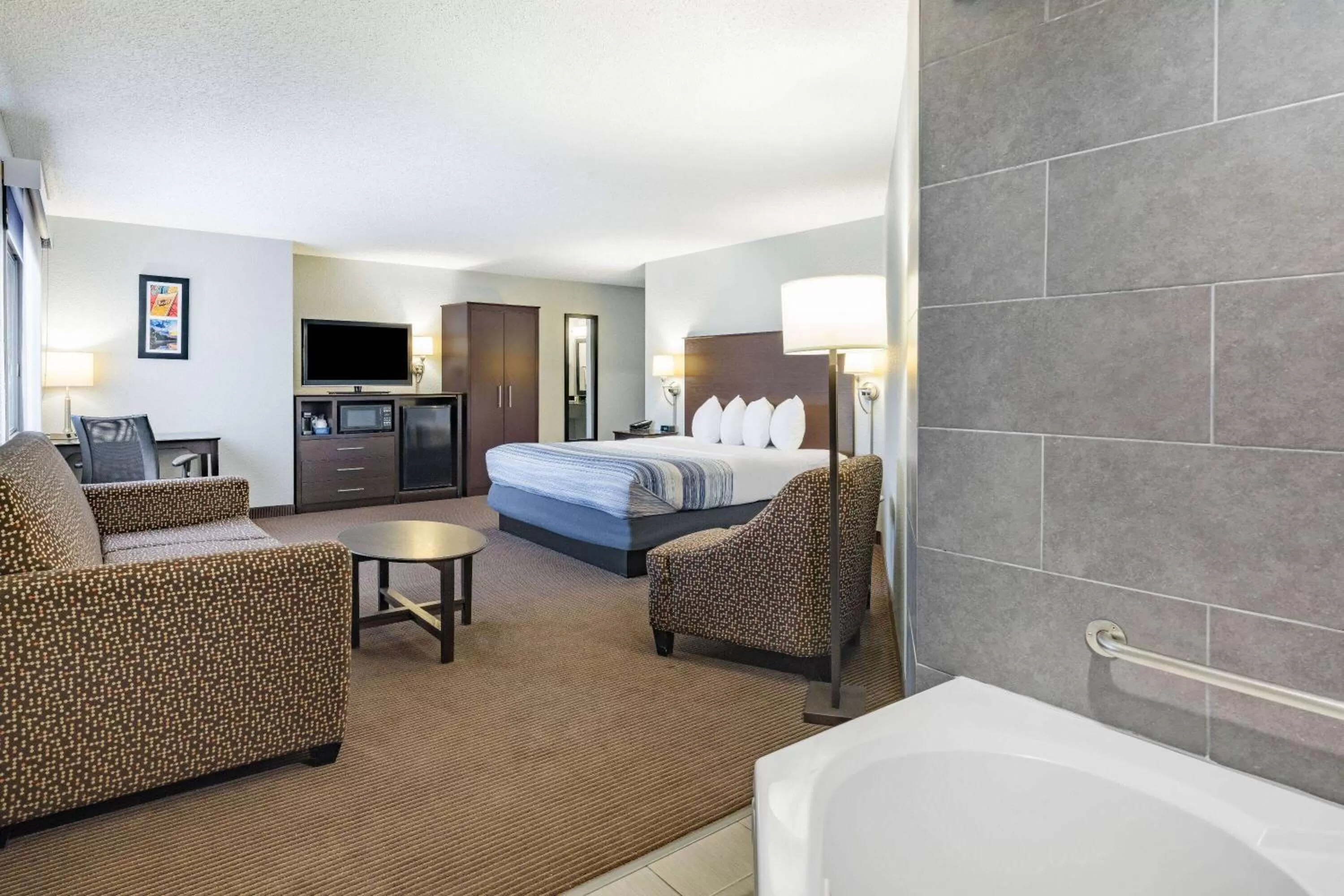 Deluxe King Studio Suite - Non-Smoking in AmericInn by Wyndham Plover Stevens Point