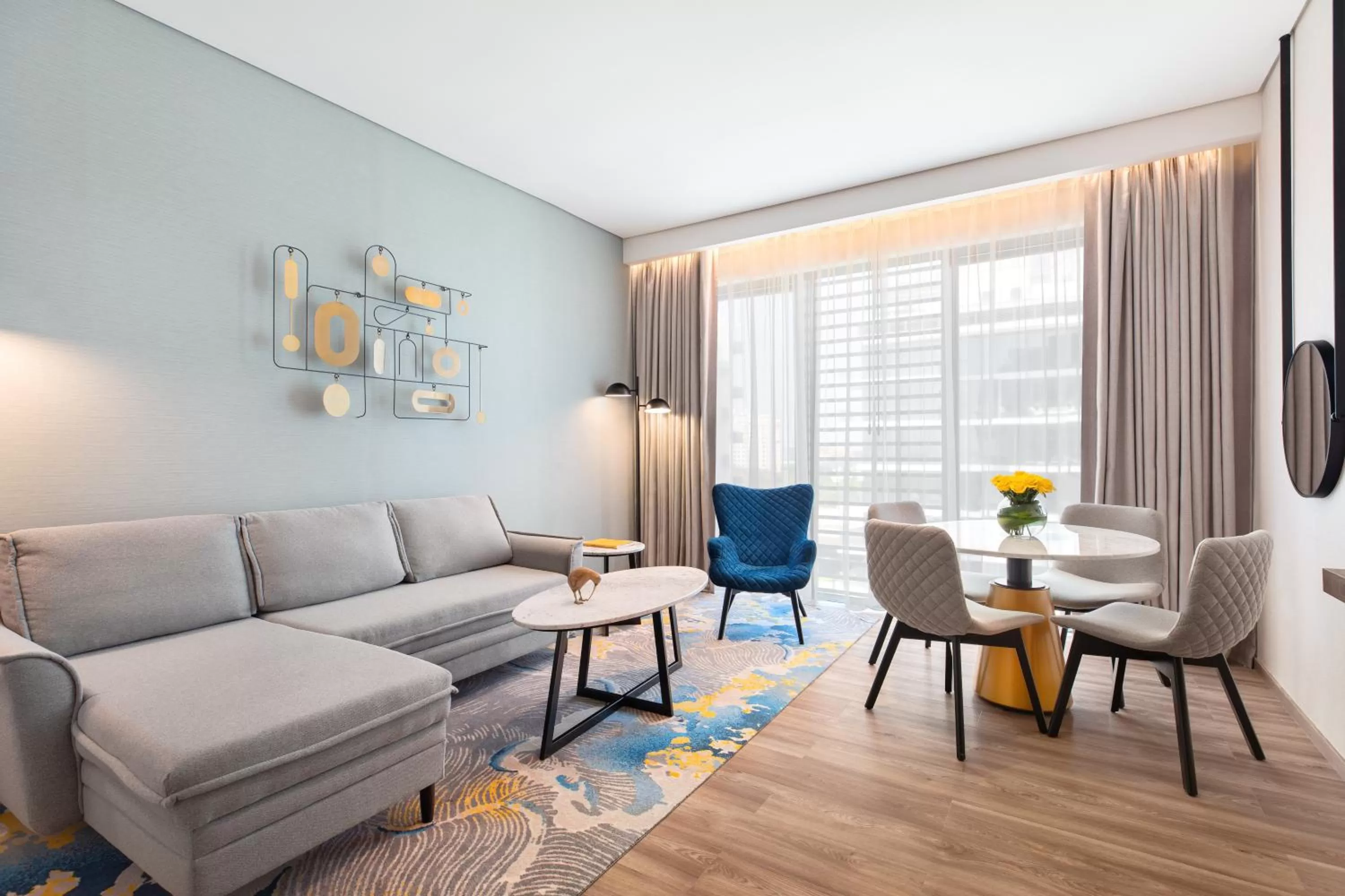 One-Bedroom Family Suite with Sofa Bed and City View in voco Dubai The Palm, an IHG Hotel