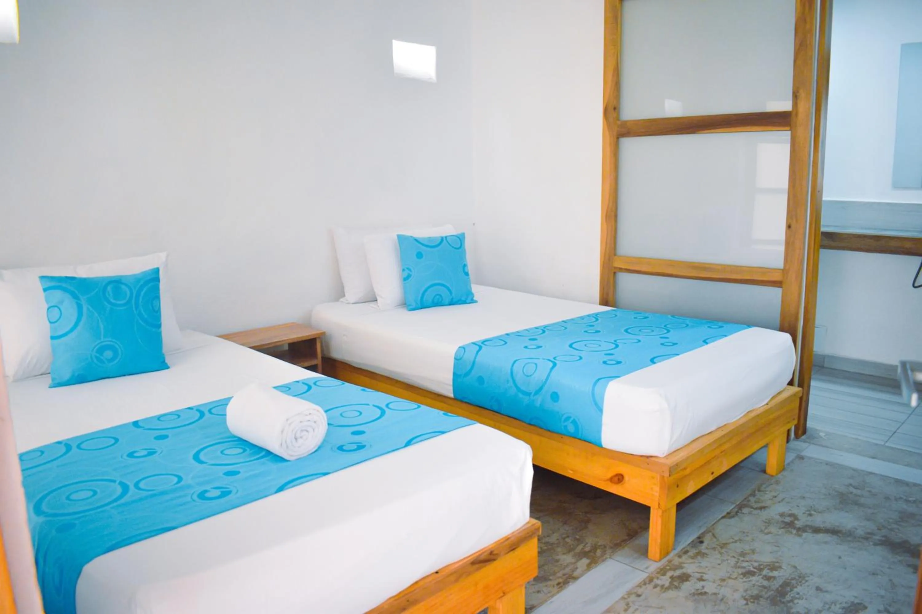 Twin Room in Hotel Sansiraka Suites By GEH Suites