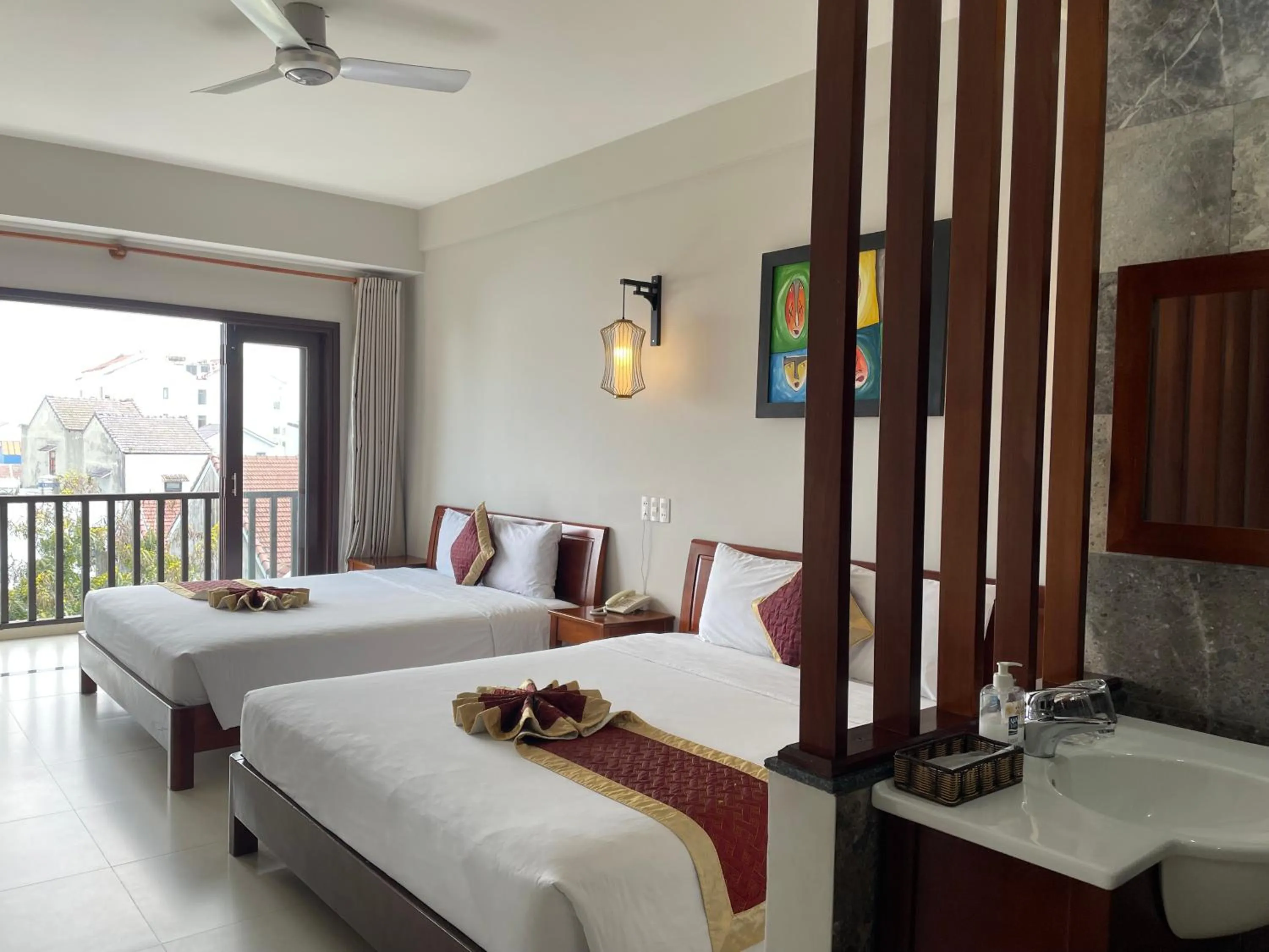Deluxe Family Room with Balcony in Sunshine Hoian Hotel