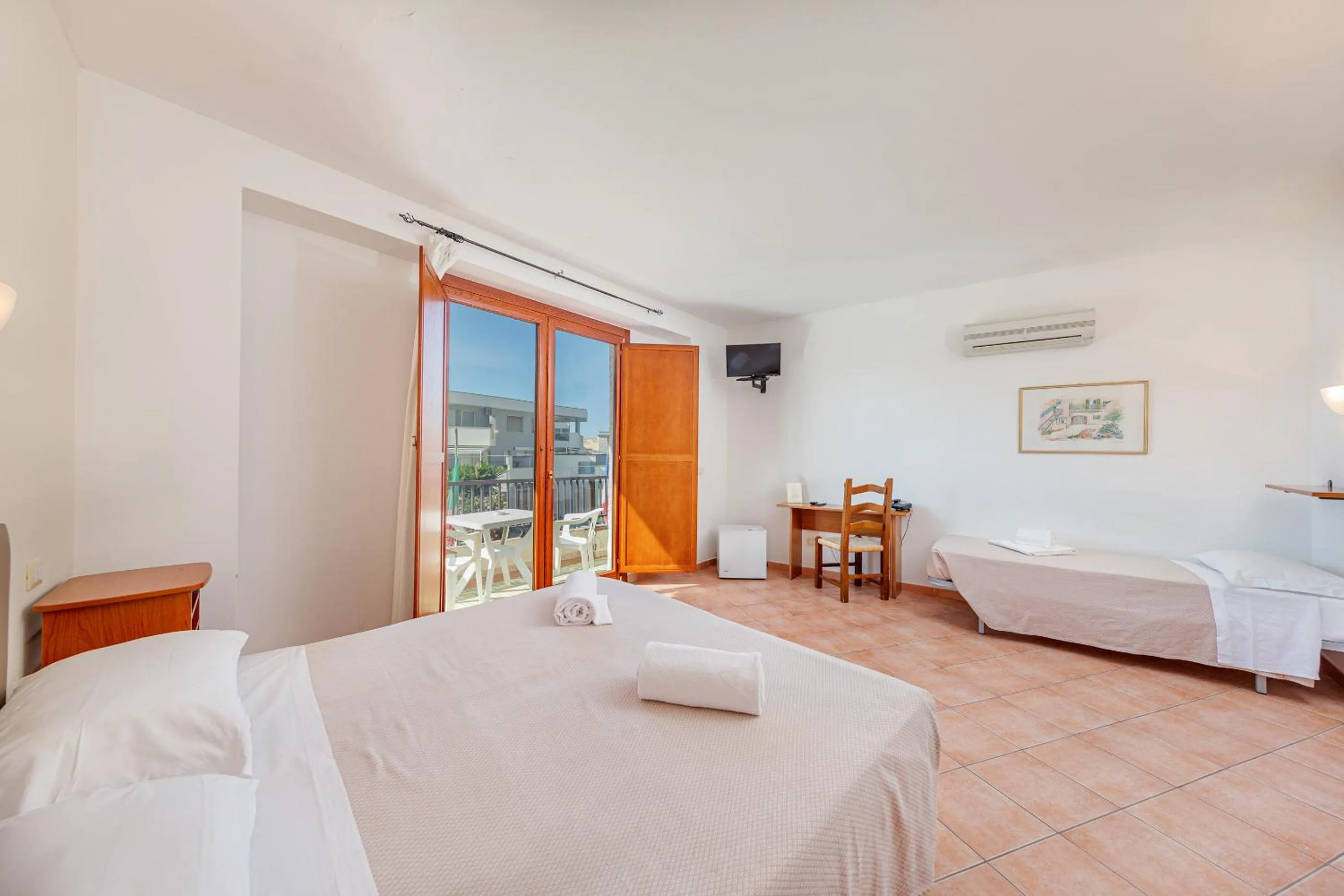 Classic Quadruple Room with Partial Sea View  in Hotel Villa Piras