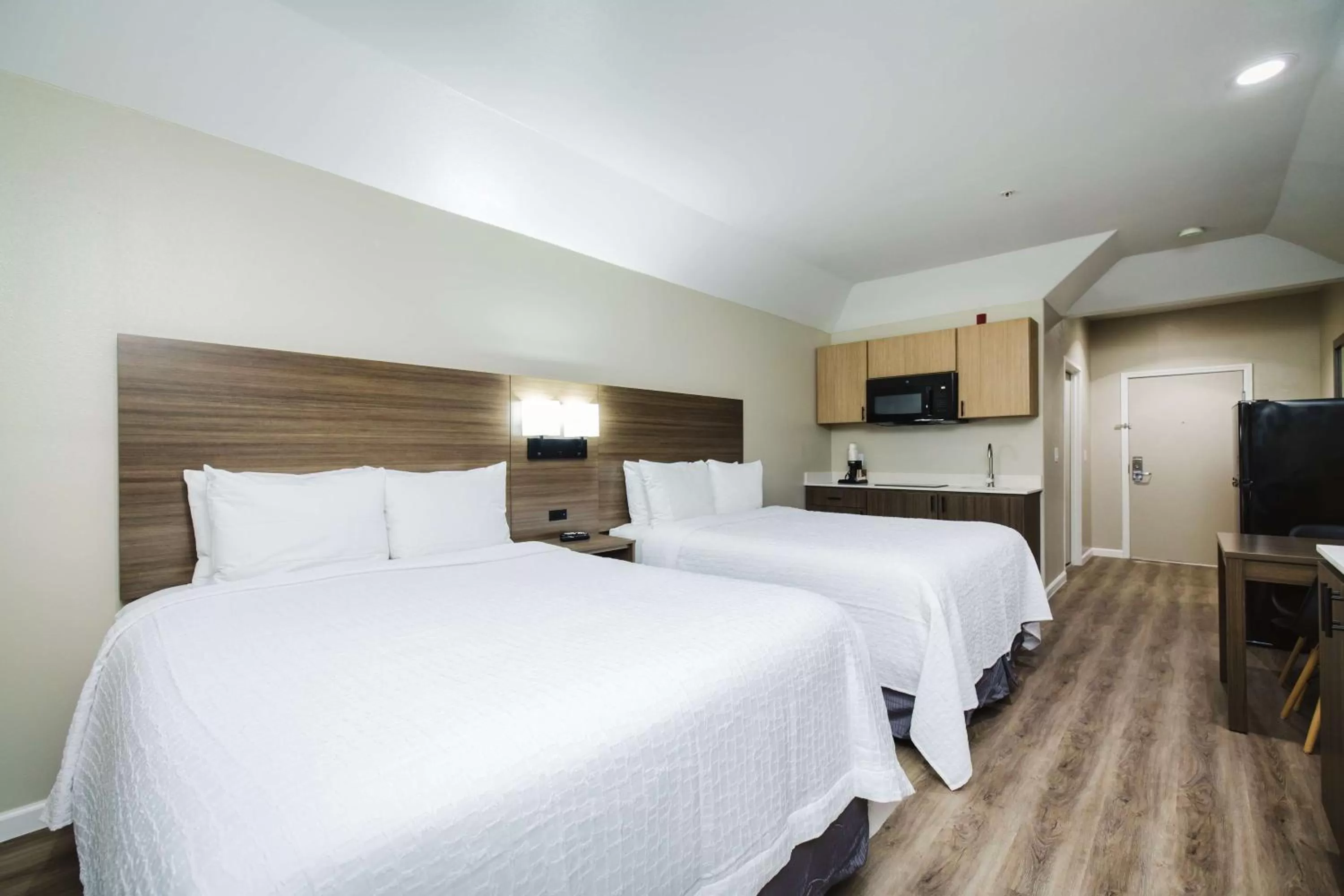 Queen Room with Two Queen Beds and Roll-In Shower - Disability Access/Non-Smoking in SureStay Studio by Best Western Conroe Downtown