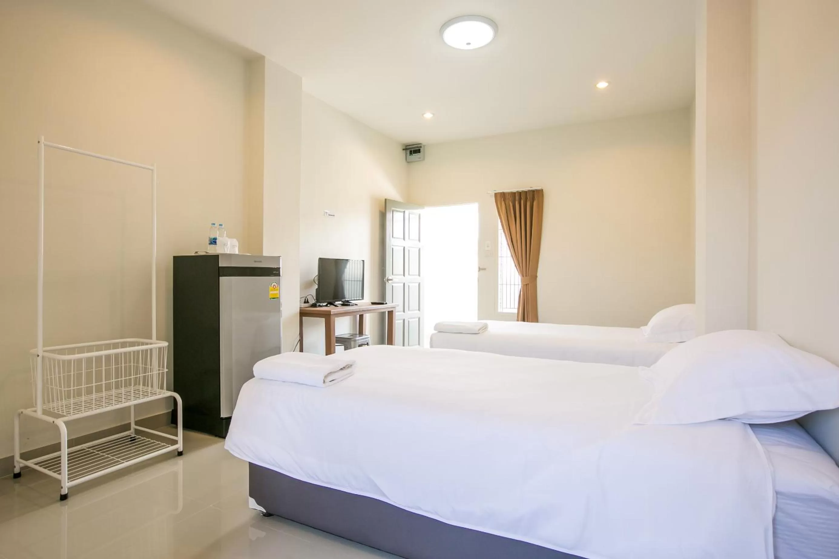 Bed in J-House Phetchaburi