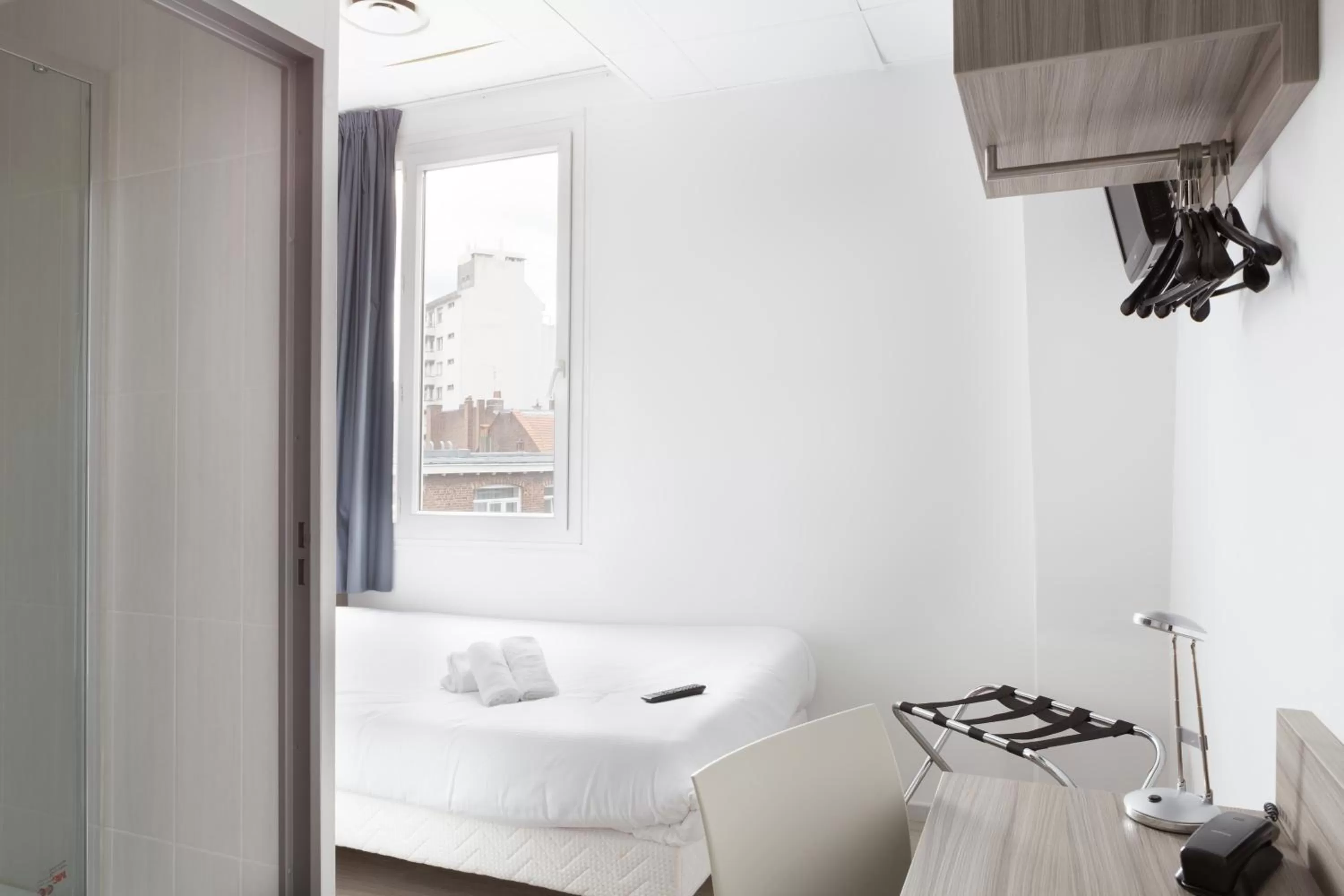 Bed in Lille City Hotel
