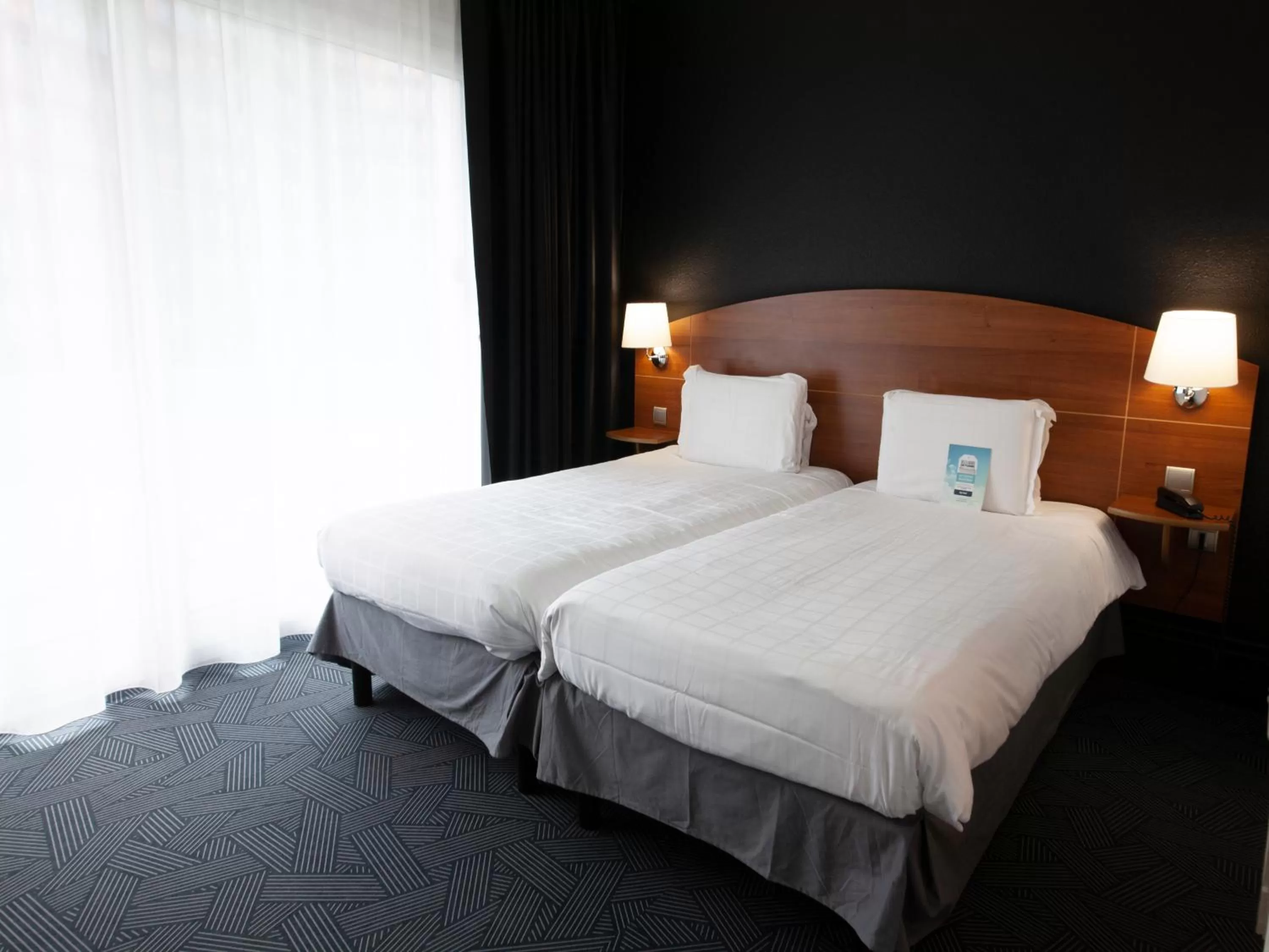 Superior Twin Room in Kyriad Hotel Clermont Ferrand Centre