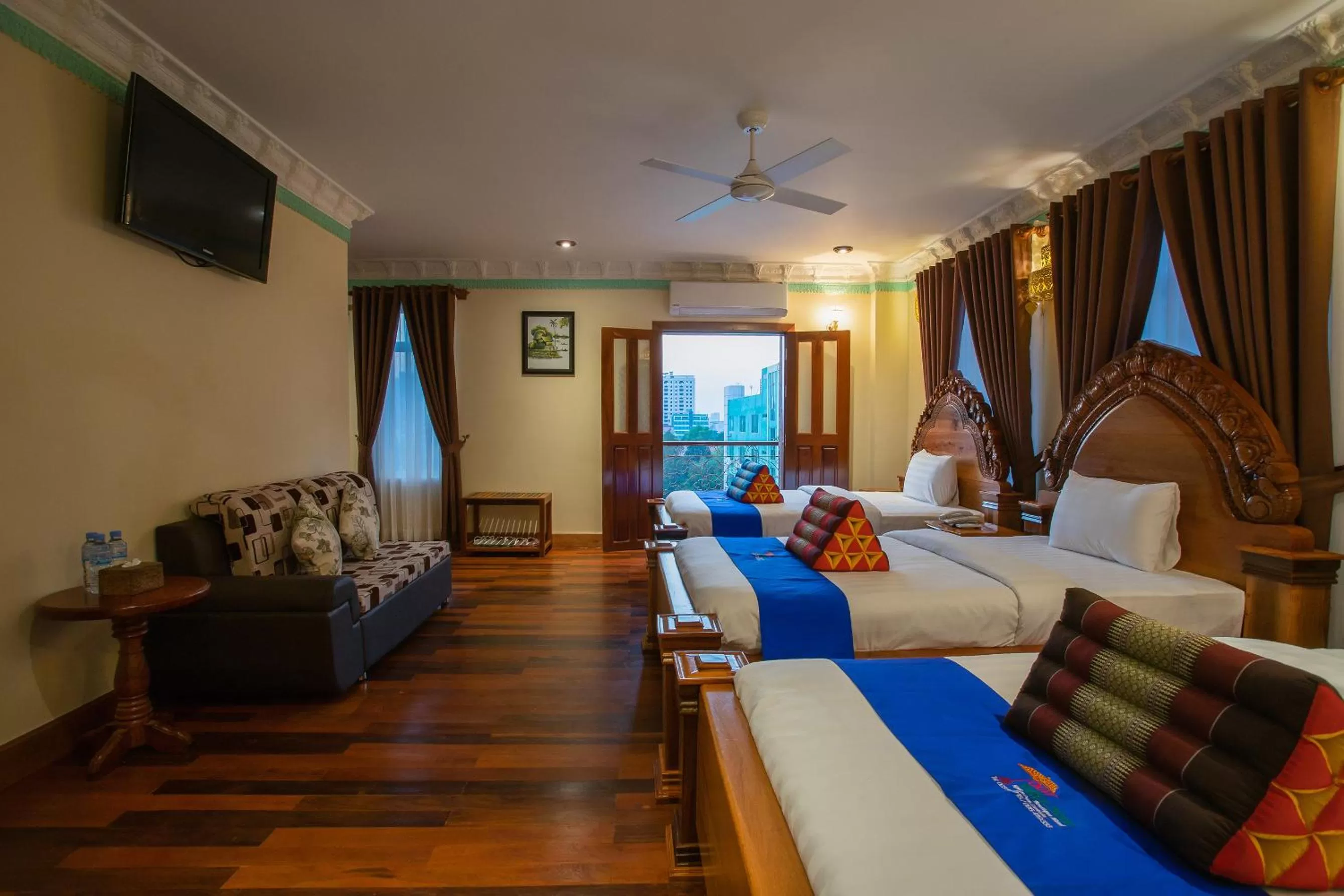 Deluxe Triple Room in Okay Palace Hotel