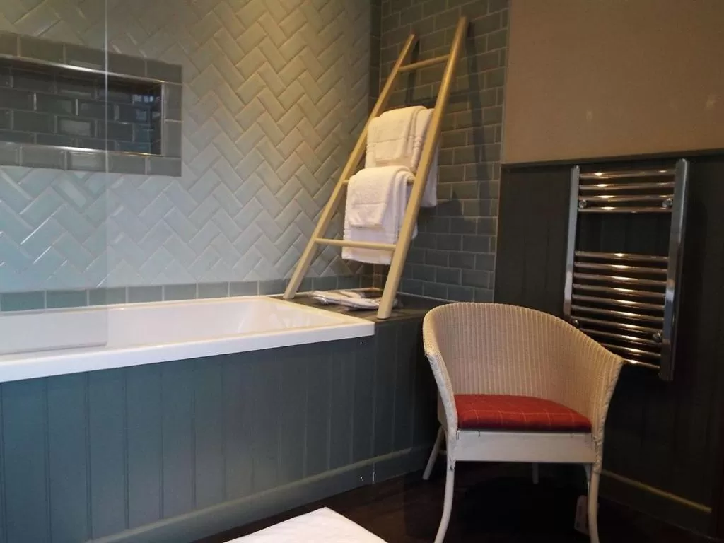 Deluxe Quadruple Room - single occupancy in The Plume of Feathers