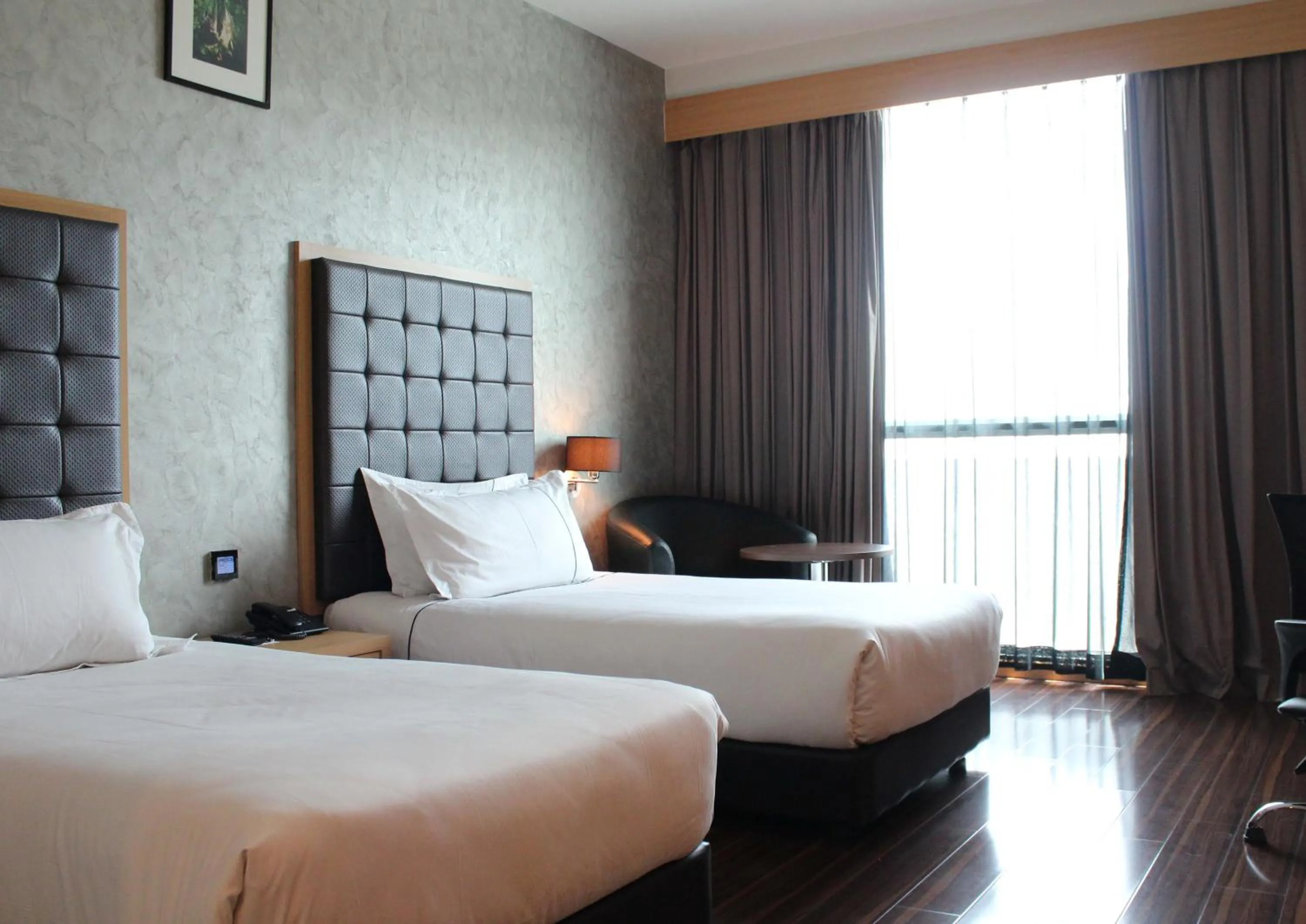 Superior Twin Room in Symphony Suites Hotel