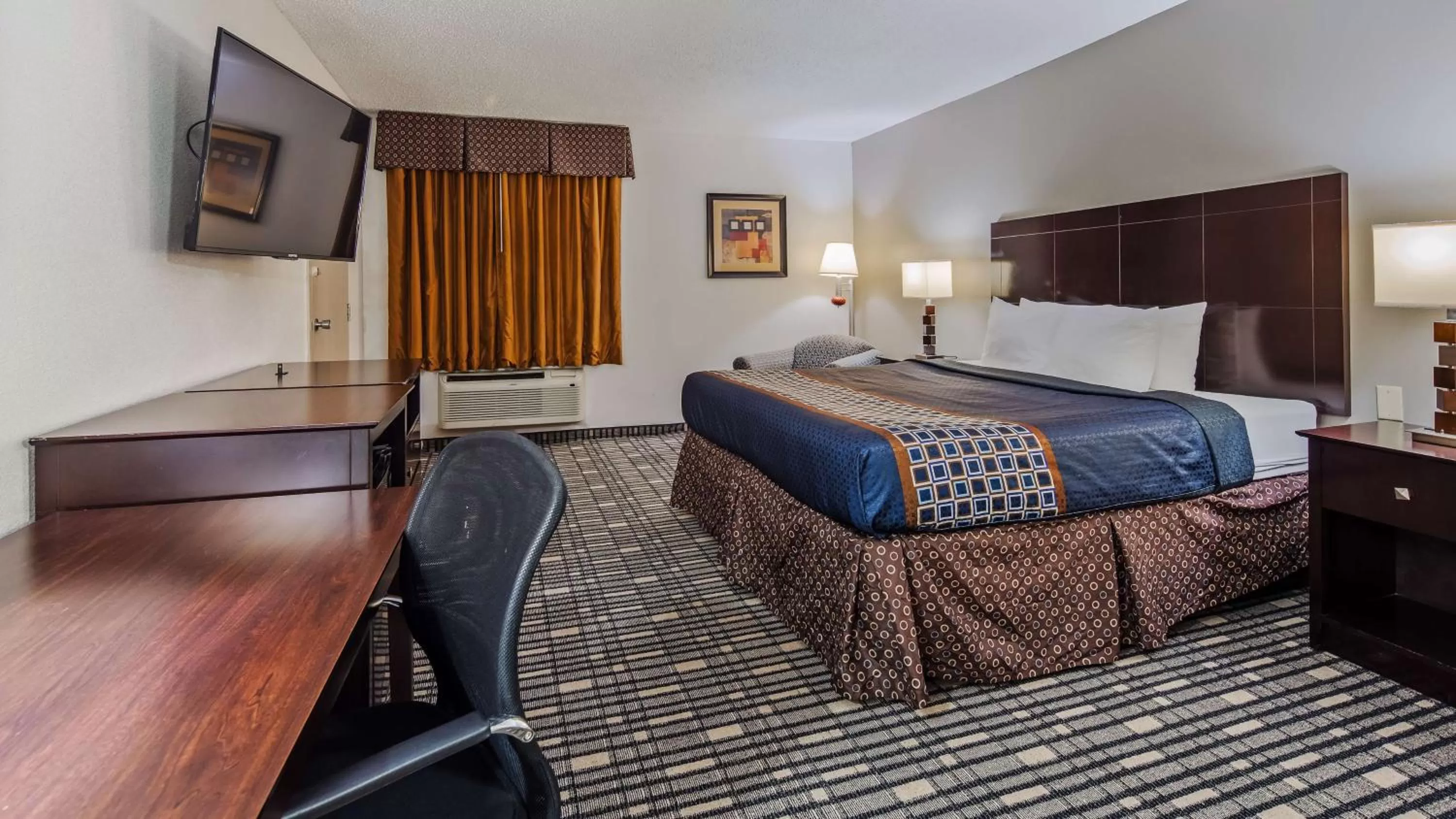 King Suite with Living Area in SureStay Plus Hotel by Best Western Lubbock Medical Center