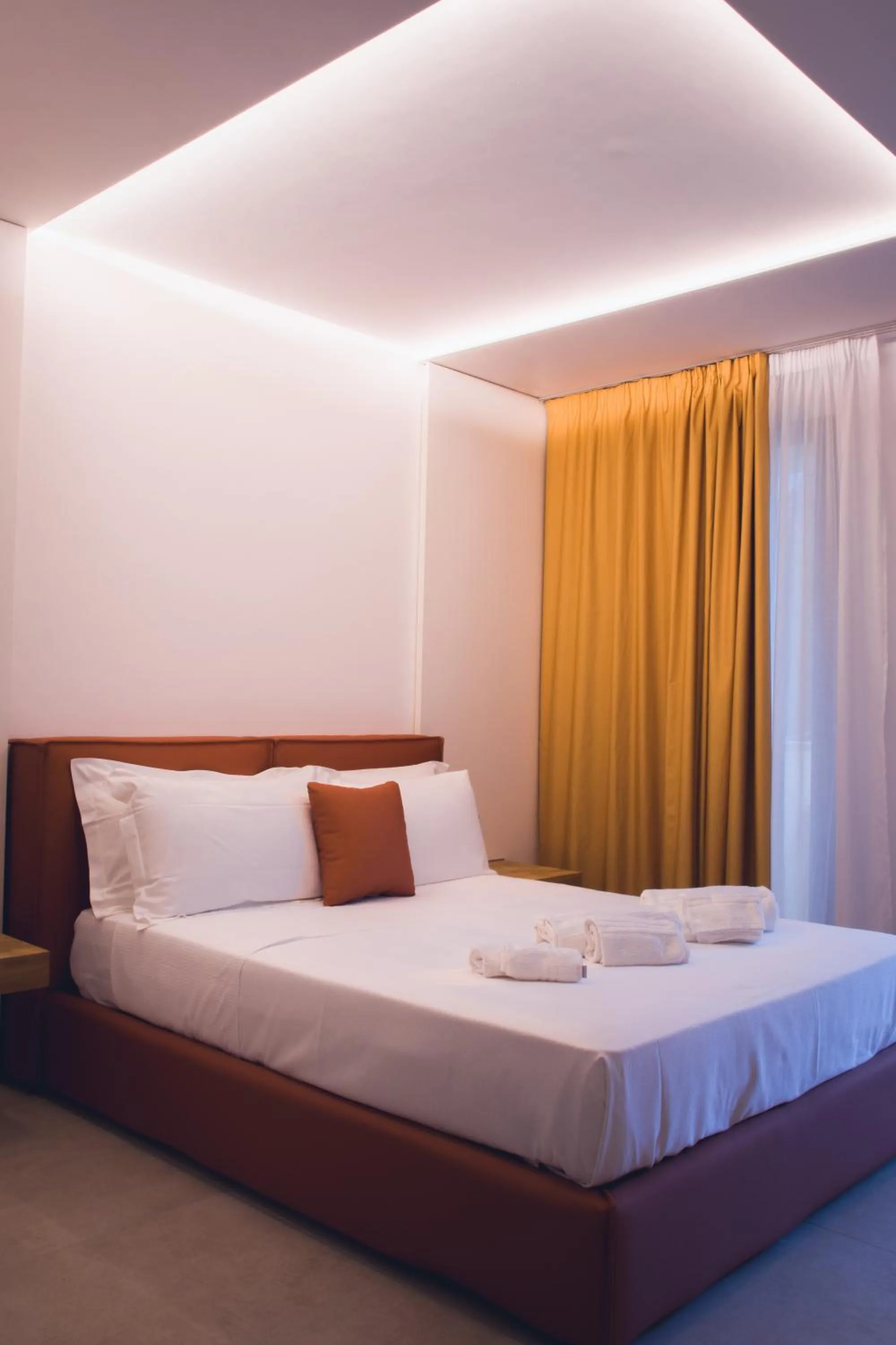 Bed in Sunset Hotel
