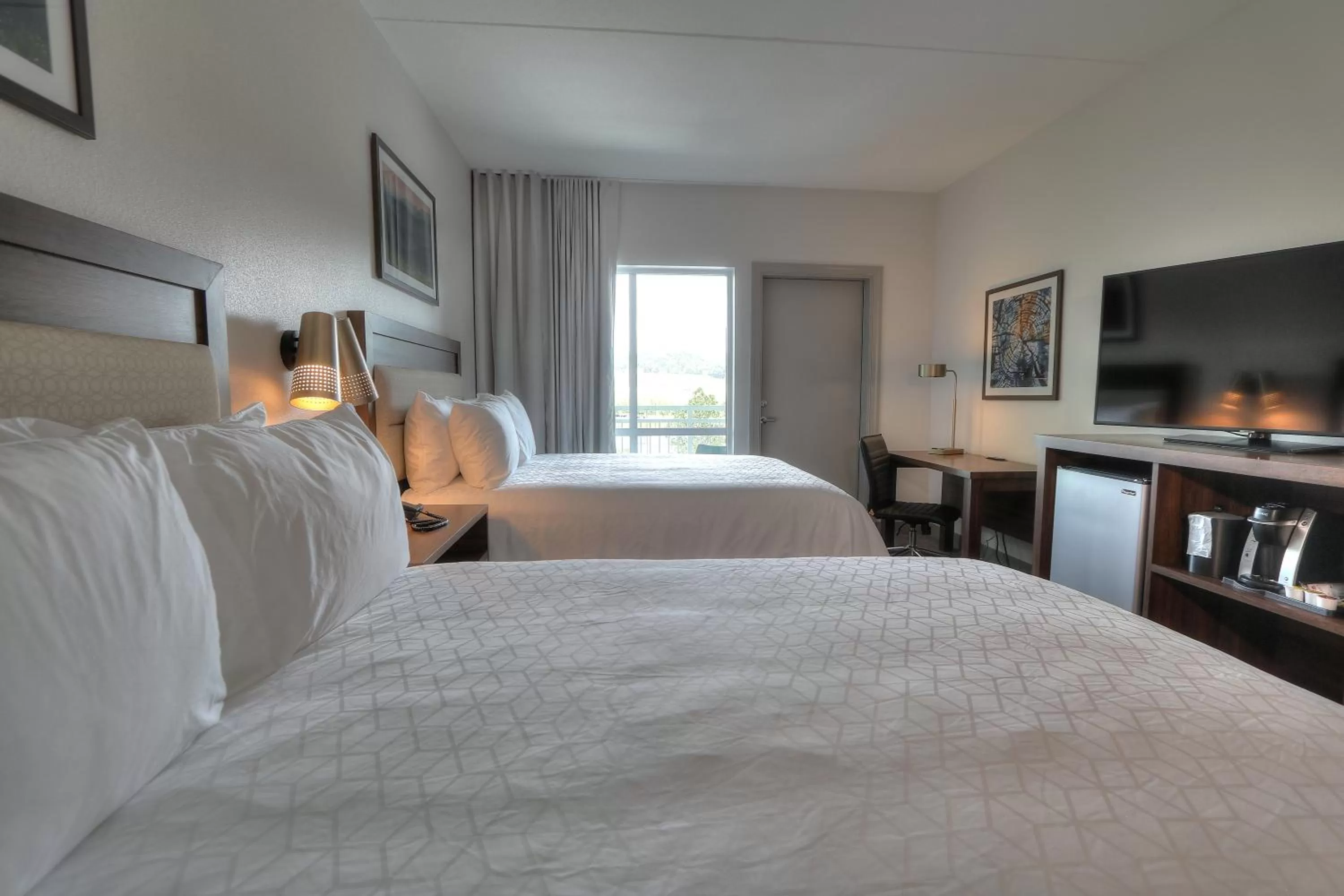 Queen Room with Two Queen Beds River Balcony and High Floor - Non-Smoking in Holiday Inn & Suites Pigeon Forge Convention Center by IHG