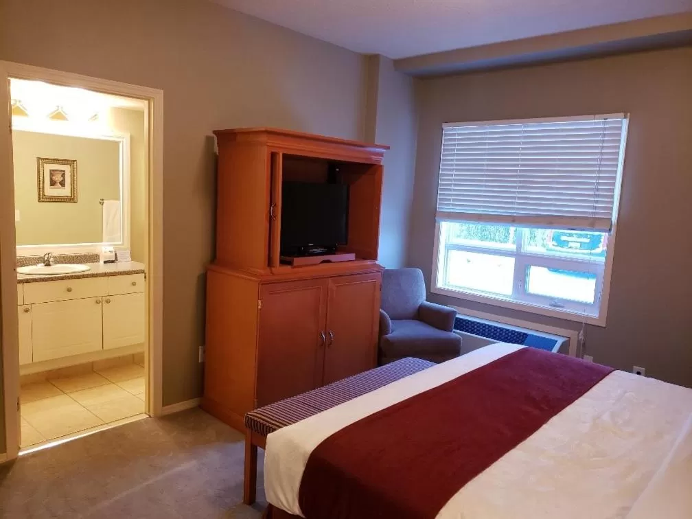 Two-Bedroom Suite with One King Bed and One Queen Bed- Non-Smoking in Travelodge by Wyndham Spruce Grove