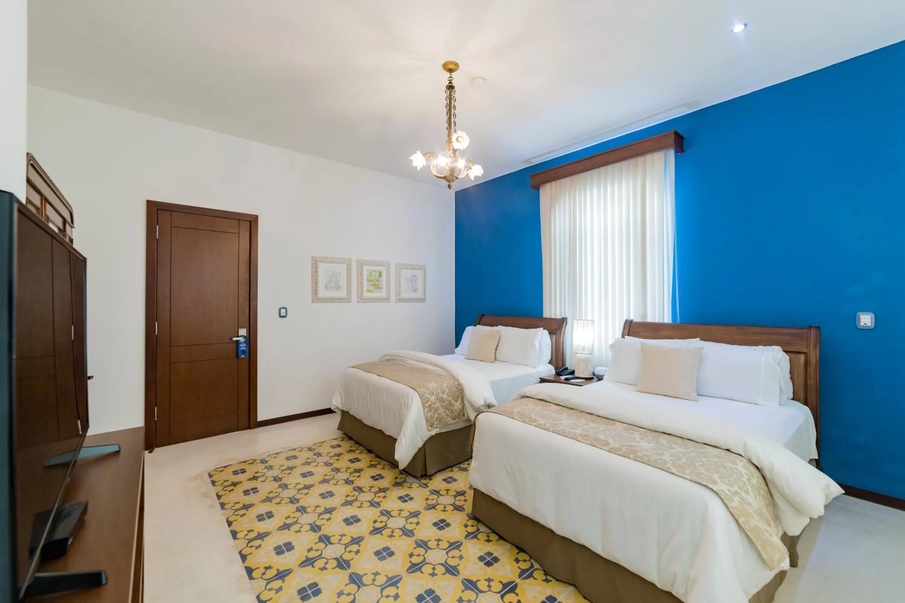 Deluxe Queen Room with Two Queen Beds in Delfina Boutique Hotel
