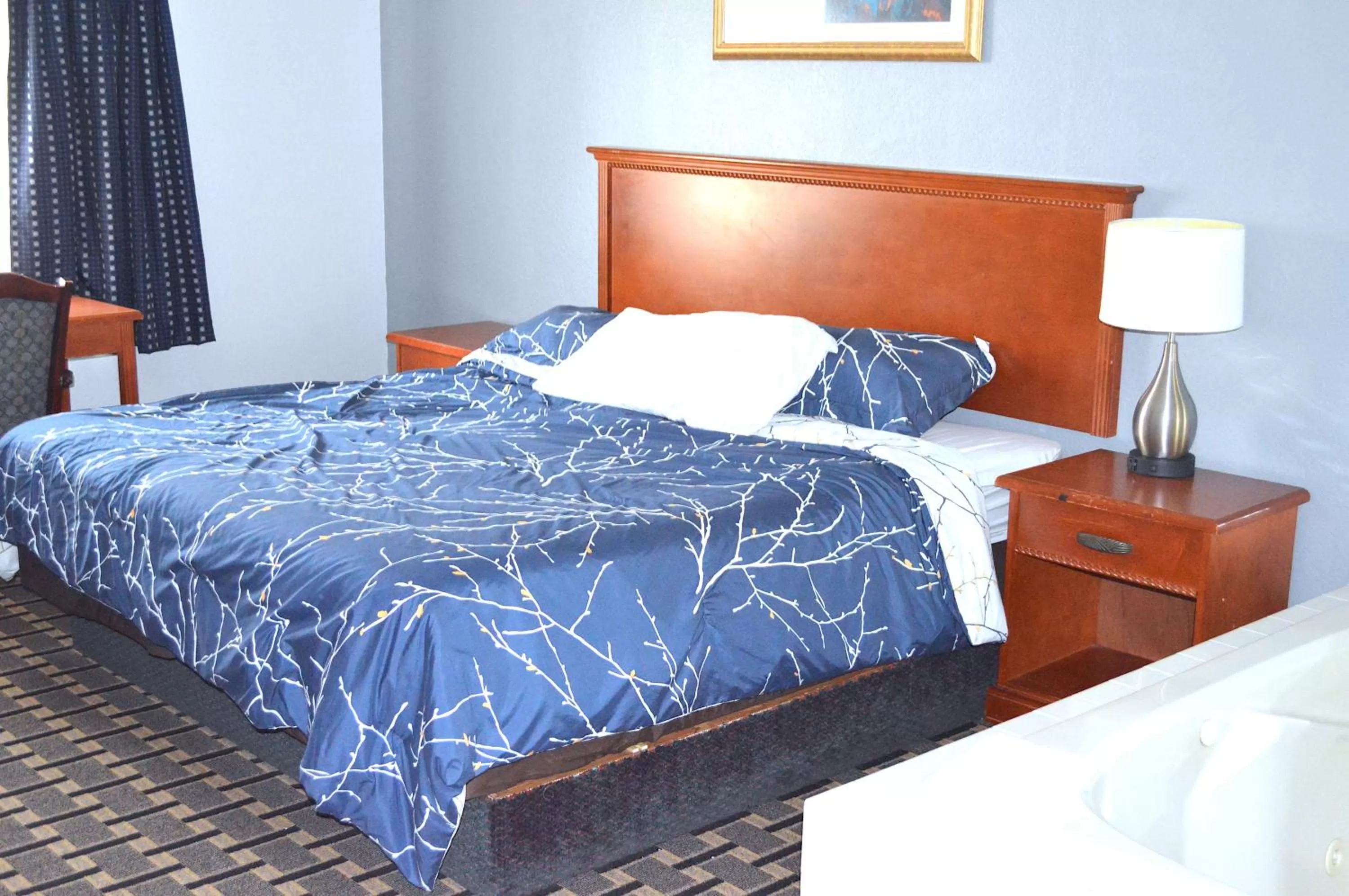 One King Bed Jacuzzi Suite Non-Smoking in Americas Best Value Inn and Suites St. Cloud