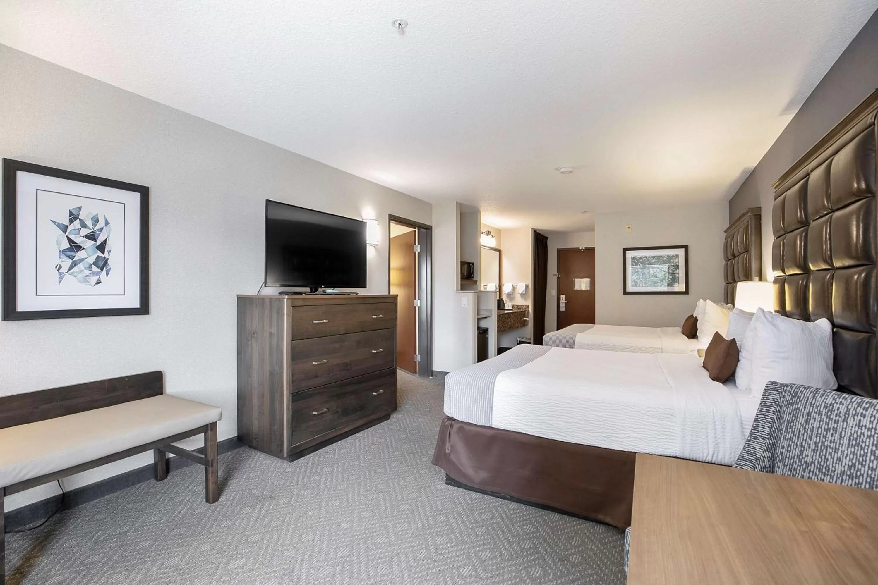 Two Room Suite with Three Queen Beds in Best Western Plus Northwind Inn & Suites