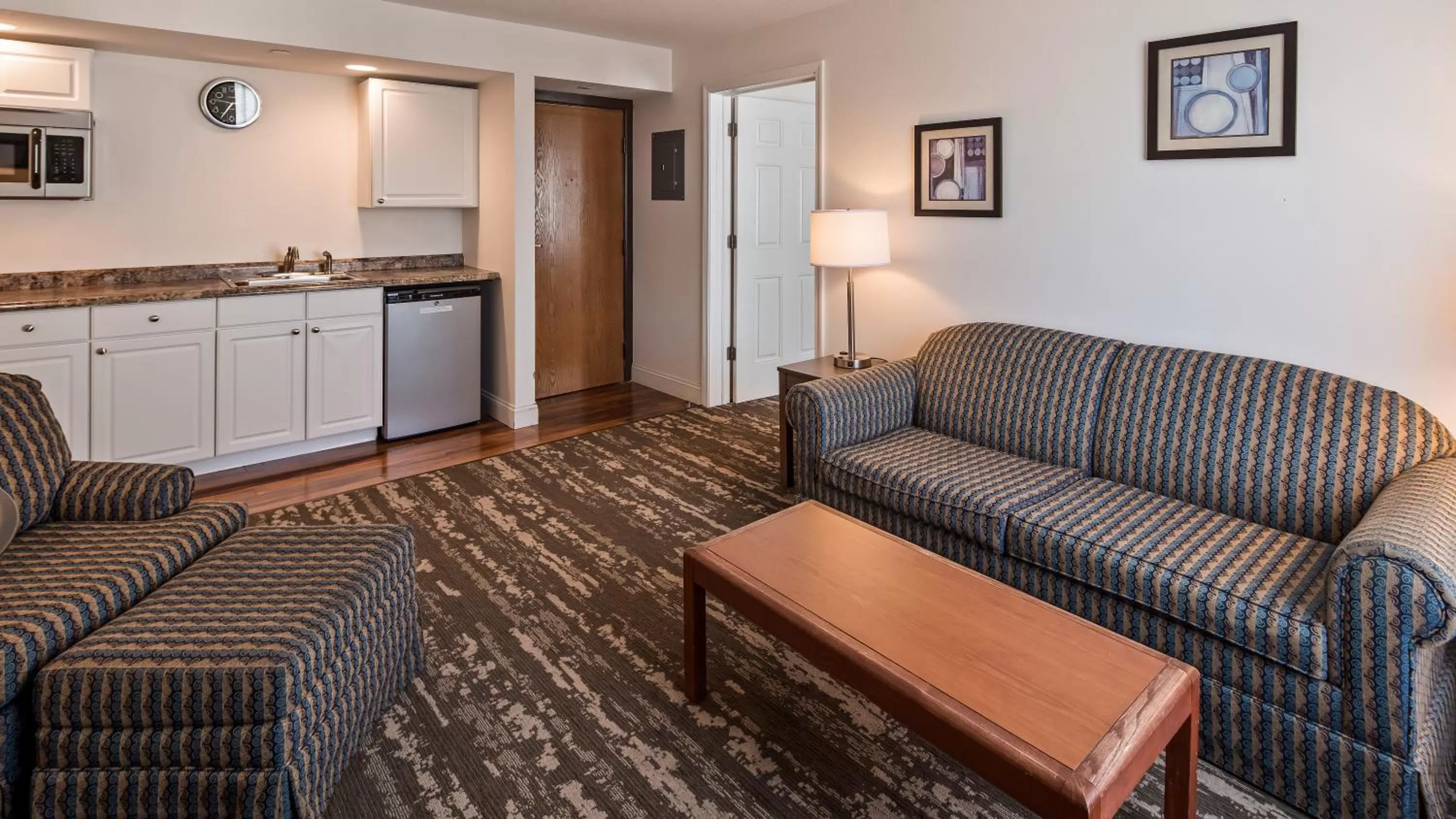 Queen Room with Mobility Accessible Walk-In Shower in Charlevoix Inn & Suites SureStay Collection by Best Western