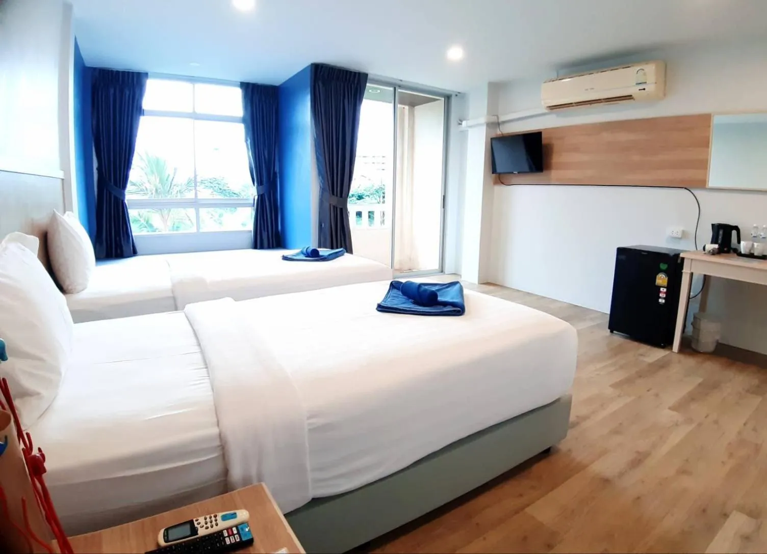 Deluxe Double or Twin Room with Garden View in Karon Living Room - SHA Plus