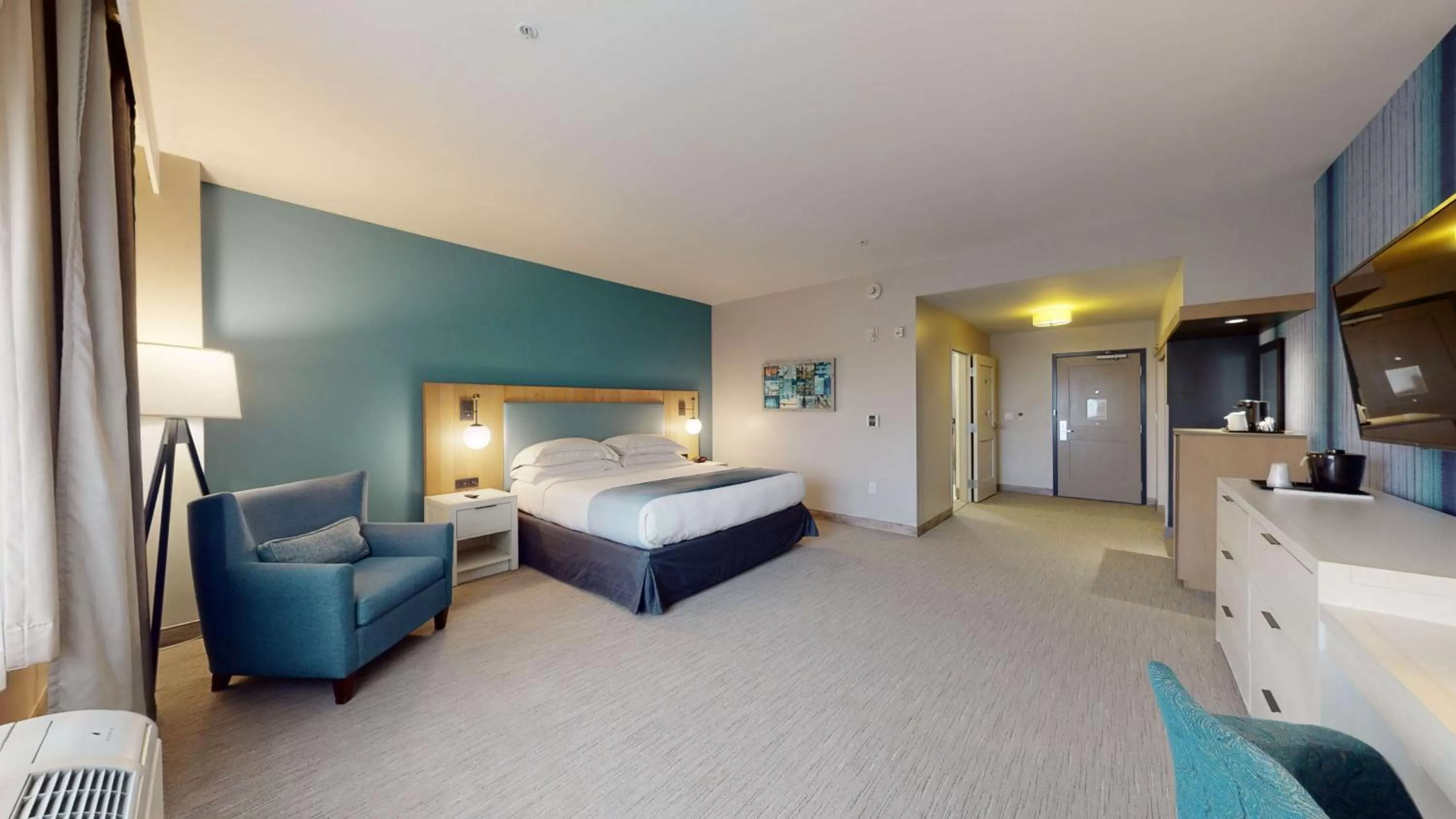 King Studio Suite with Roll-in Shower - Mobility/Hearing Access in SunCoast Hotel Anaheim, Tapestry Collection by Hilton