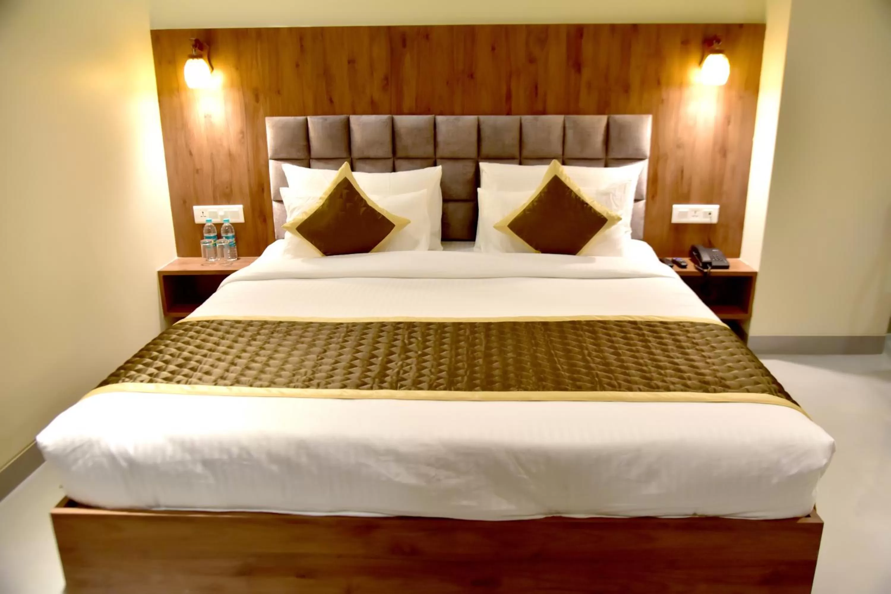 Bed in Hotel Aarna